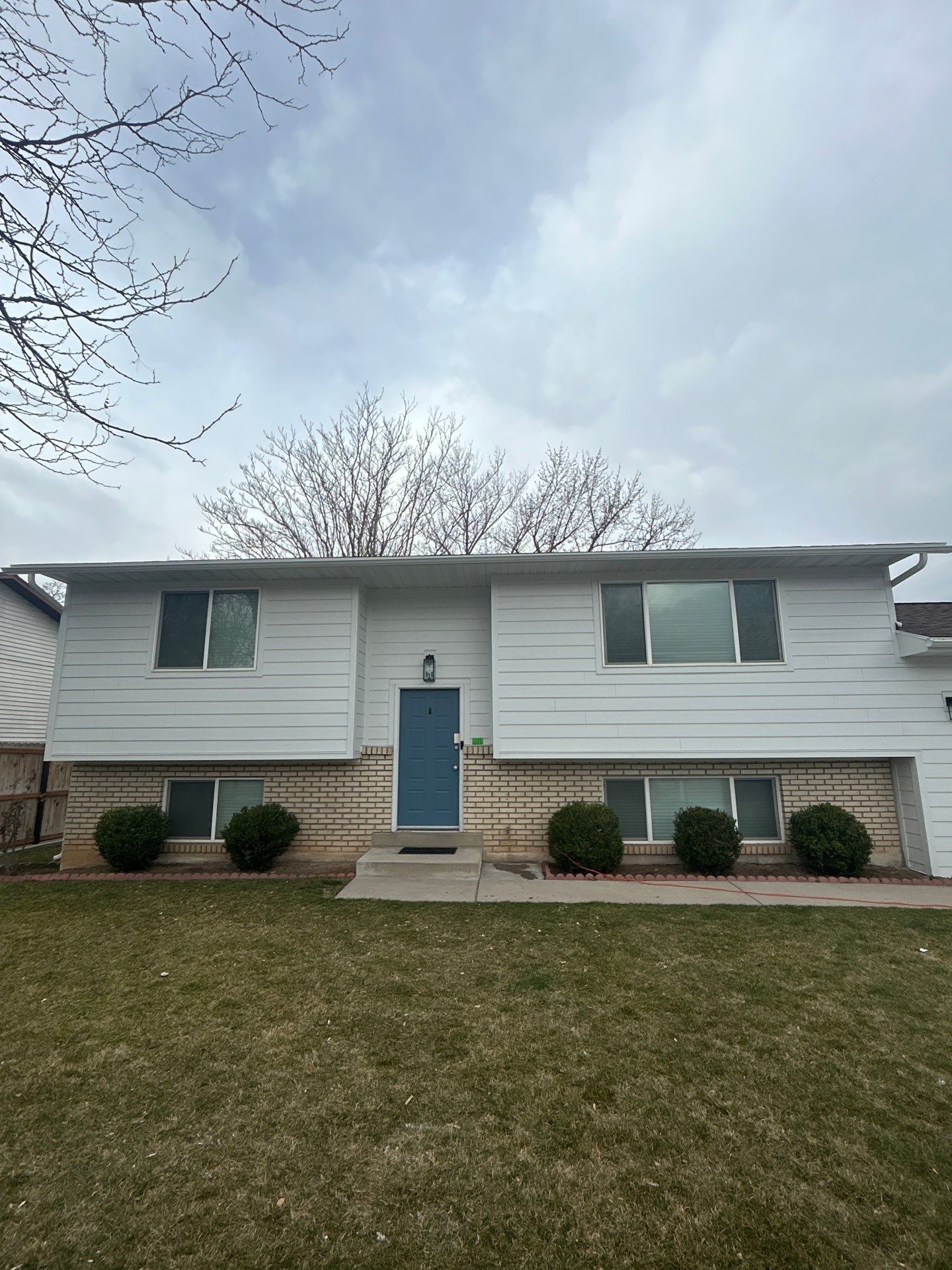 Orem | Crisp Monochromatic Hardie Upgrade | Arctic White by Ideal Siding Utah