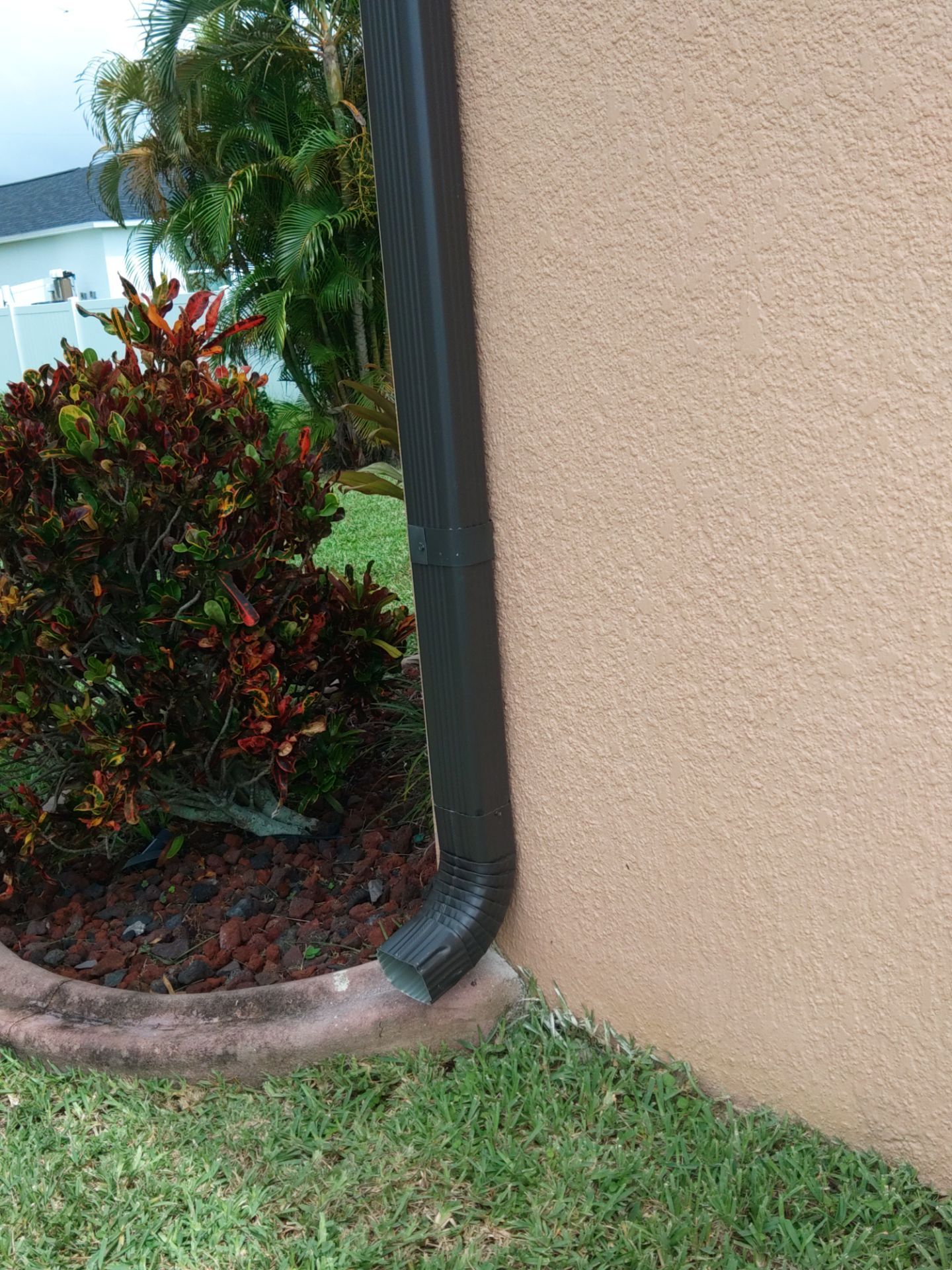 Downspout Installation for Multi-Story Homes in Cape Coral FL by Gutter Professors
