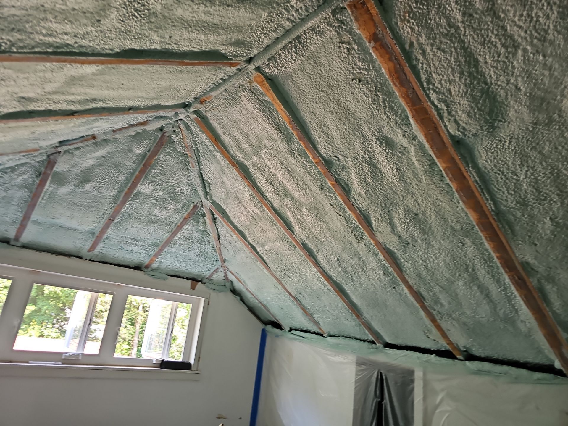Attic Insulation using open cell spray foam by NYS Foam & Energy