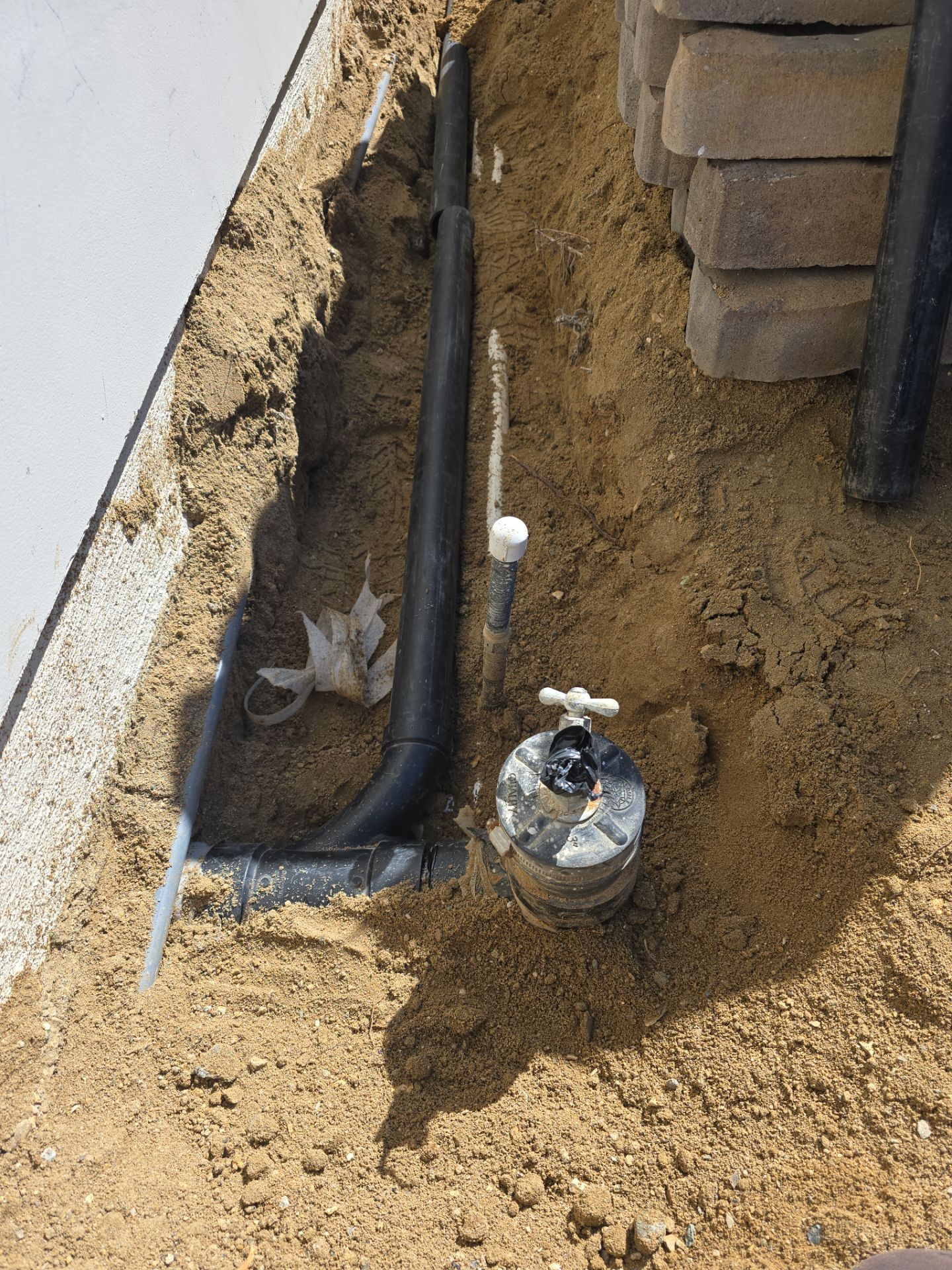 Installing Exterior Water House Line Piping by Us Plumbing