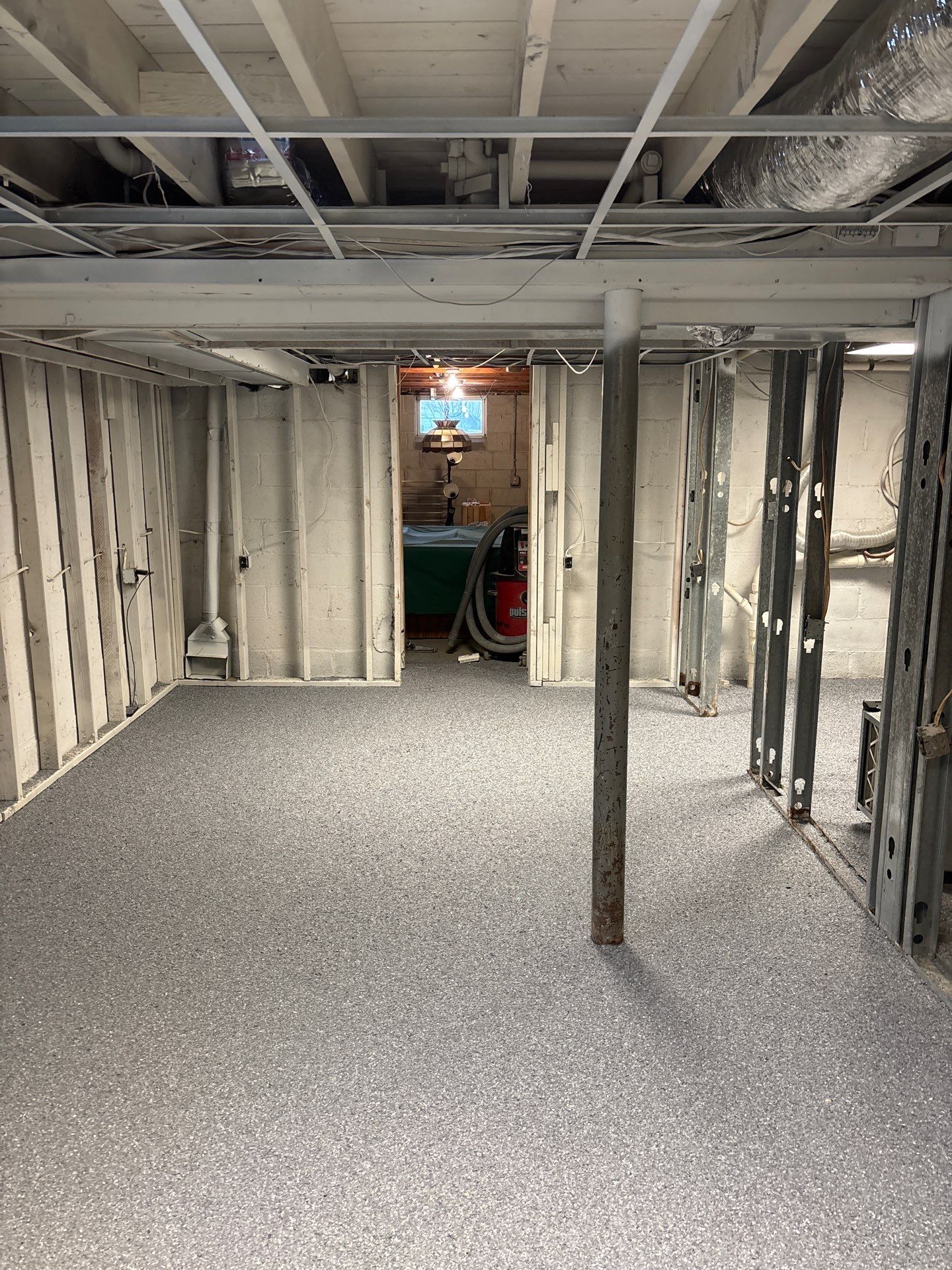 Basement Concrete Floor Coating with Penntek Flake System by Spectrum Painting, LLC
