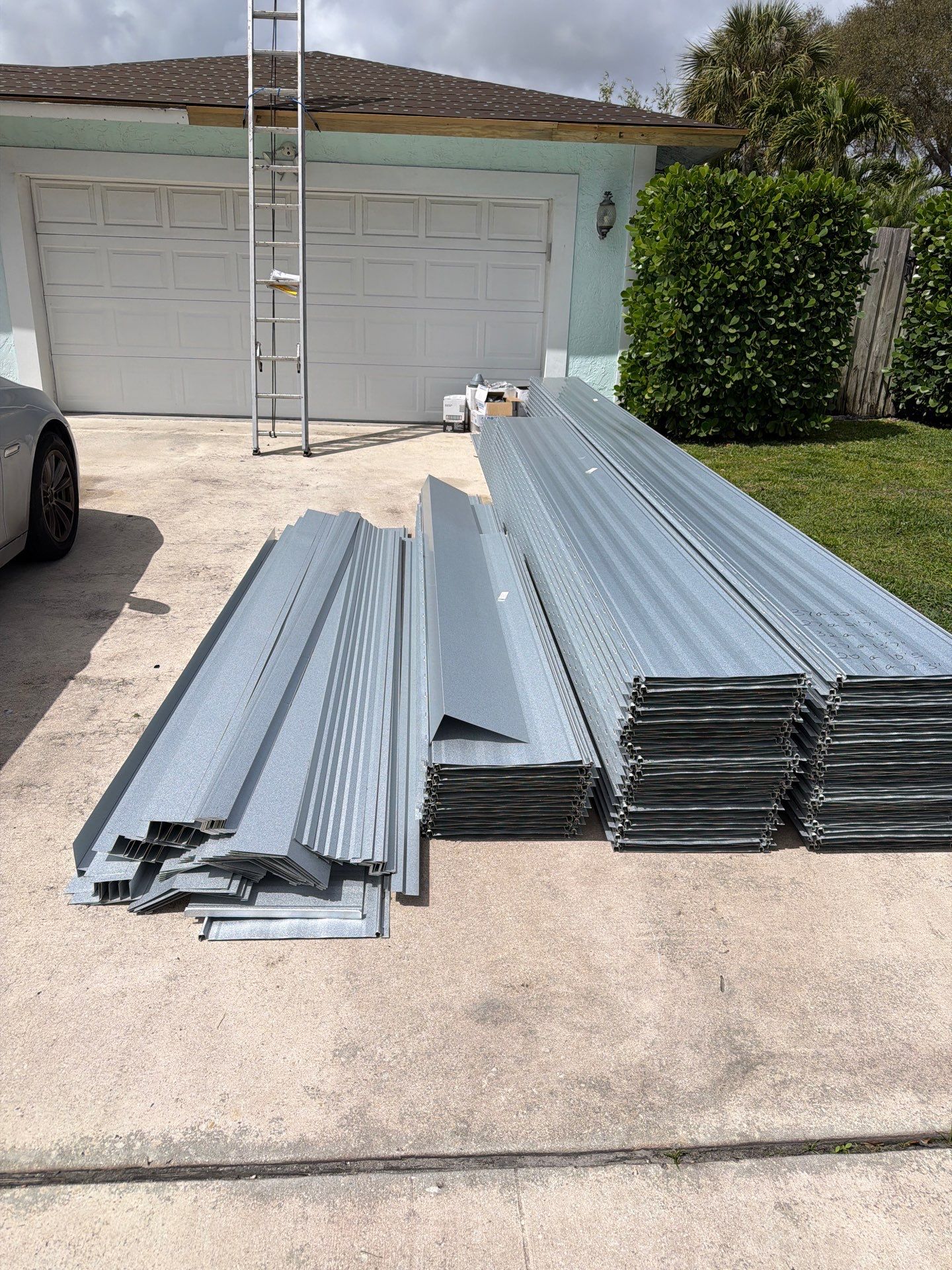 Residential Roofing Installation using 1" Nail strip metal roof by BLUES BROTHERS ROOFING