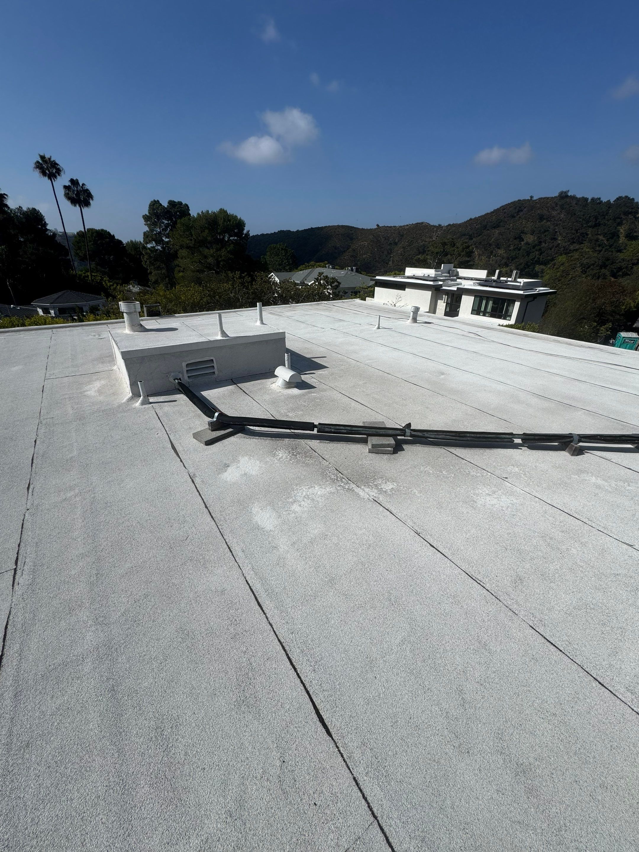 Flat Roof Reflective Coating and Repairs in Brentwood by Hull Brothers Roofing