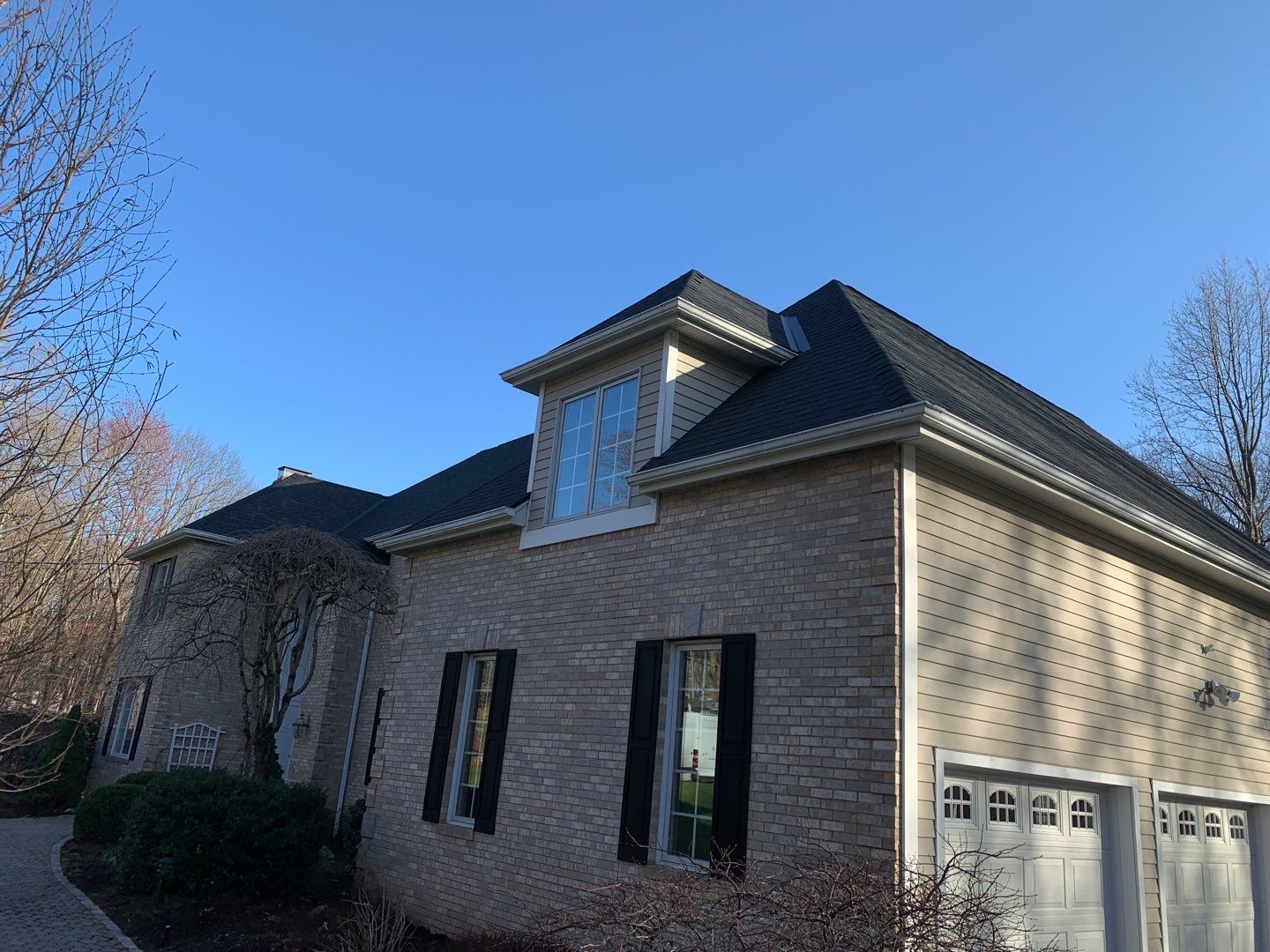 Residential Roofing Installation using Owens Corning TruDefinition Onyx Black by A Plus Exterior