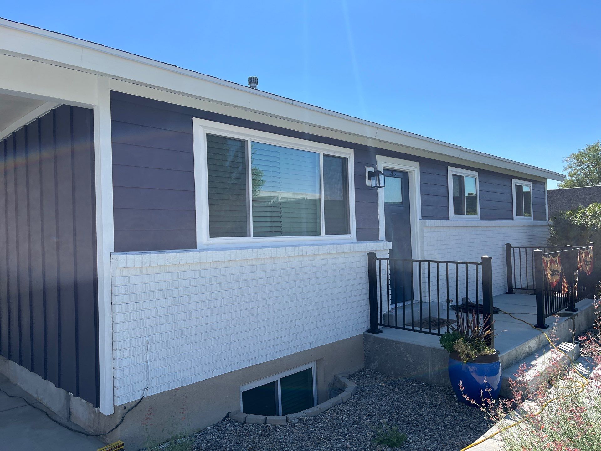 West Jordan | Custom Painted Hardie Upgrade | SW Midnight & Arctic White by Ideal Siding Utah