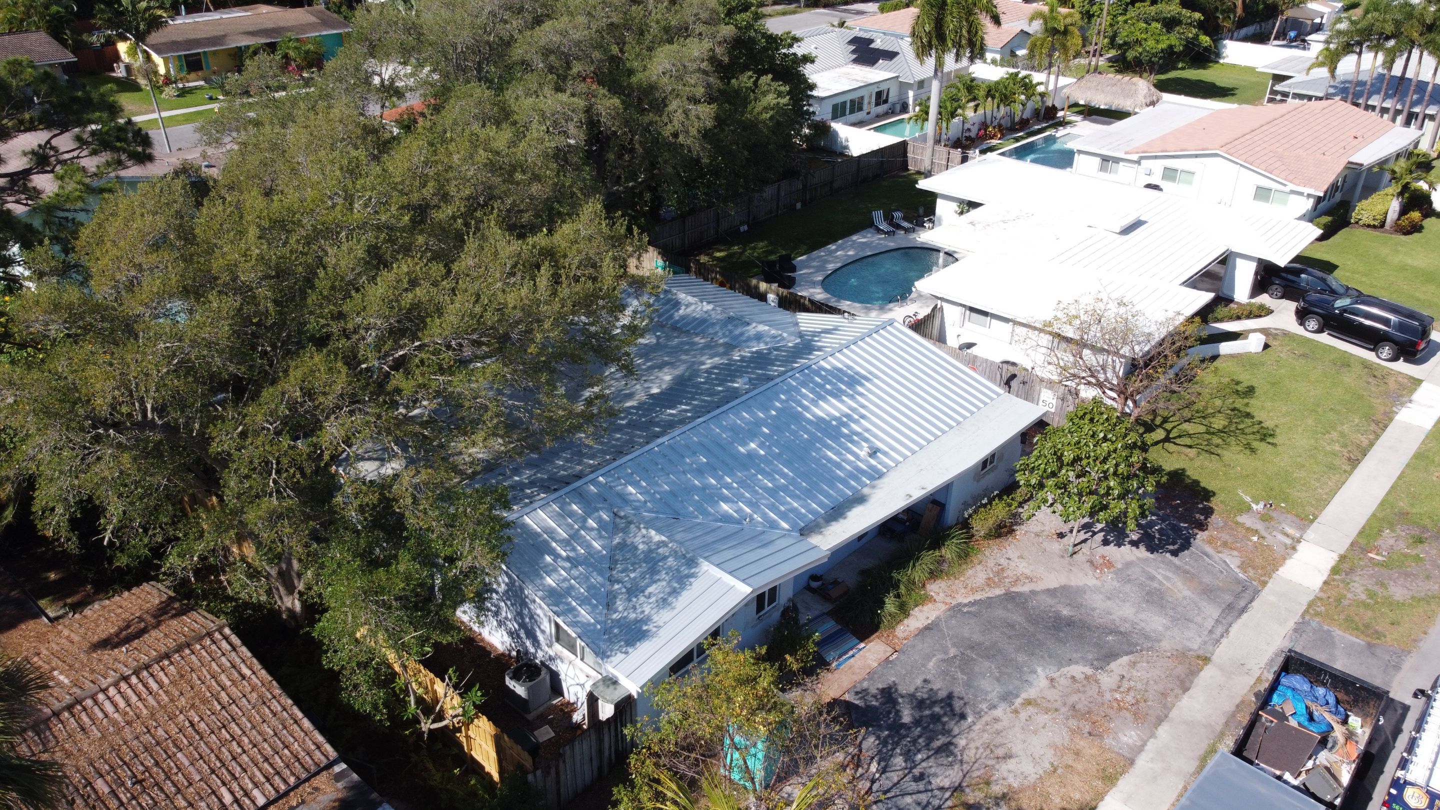 Residential Roofing Installation using 1.5'' Mechanical Seam by BLUES BROTHERS ROOFING