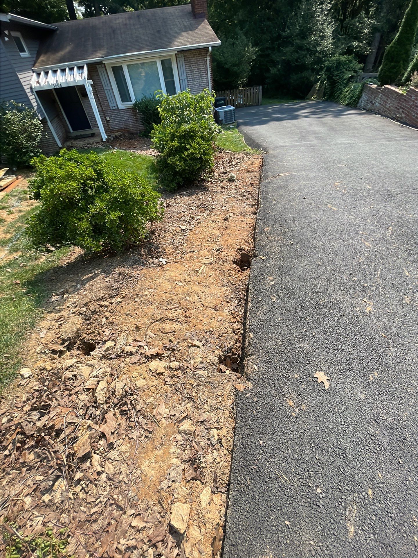 New walkway with stairs and a new front porch by Fairfax Contractors, LLC