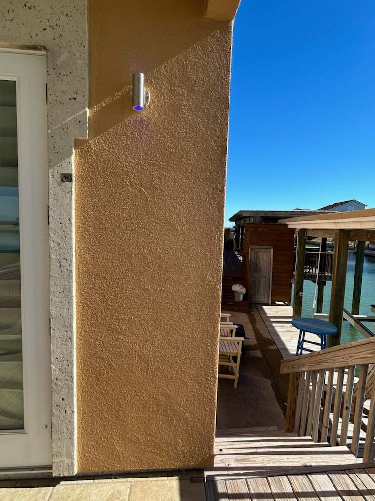 Waterfront Walkout Waterproofed! by Bayfront Roofing and Construction