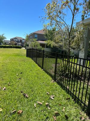 Aluminum Fence Installation using Black 3 Rail Aluminum and Vinyl Privacy Fence 