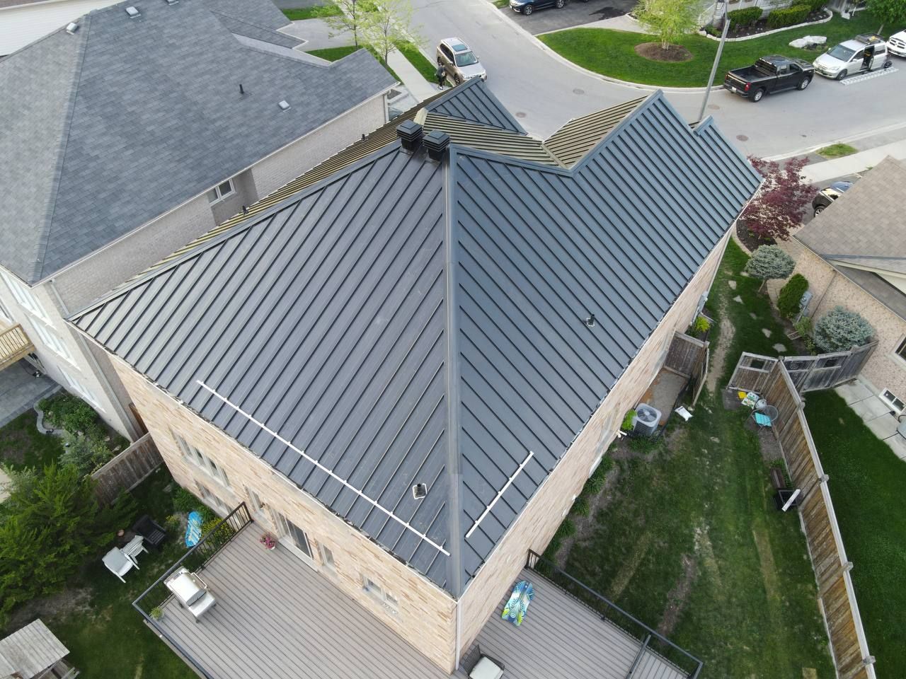 Residential Roofing Installation using 16" Standing Seam Panels by Jay Carter Roofing & Sheet Metal