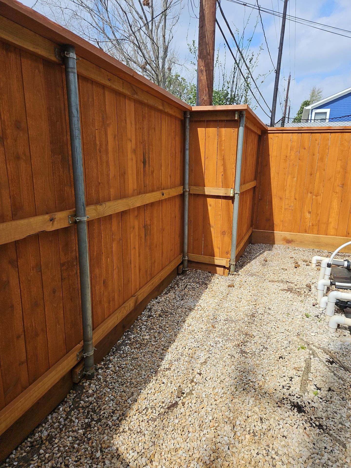 Durable Fence & Gate Installation with Premium Stain by Tim's Fences
