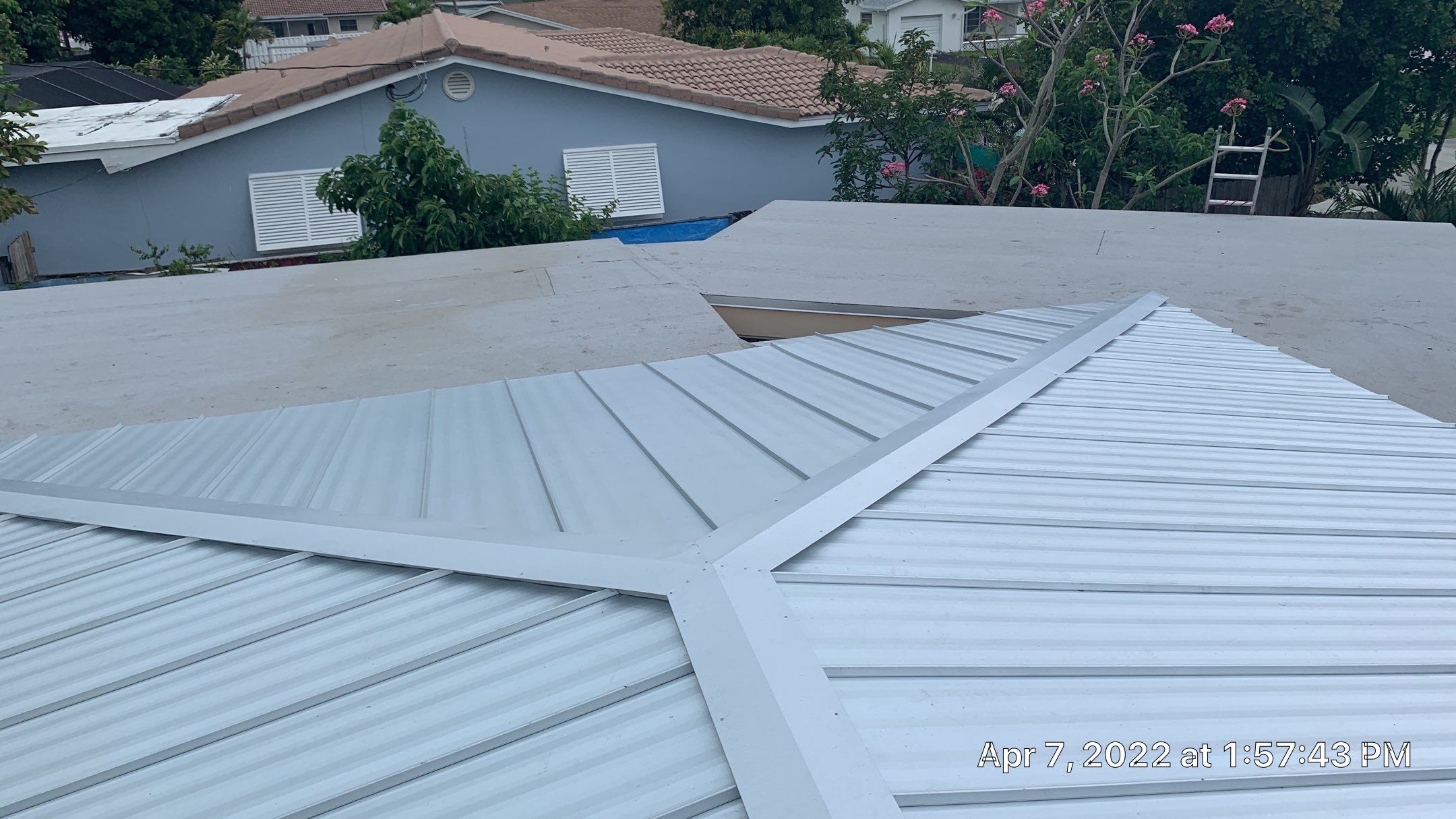 Residential Roofing Installation using 1" Nail strip metal roof by BLUES BROTHERS CONSTRUCTION CORP