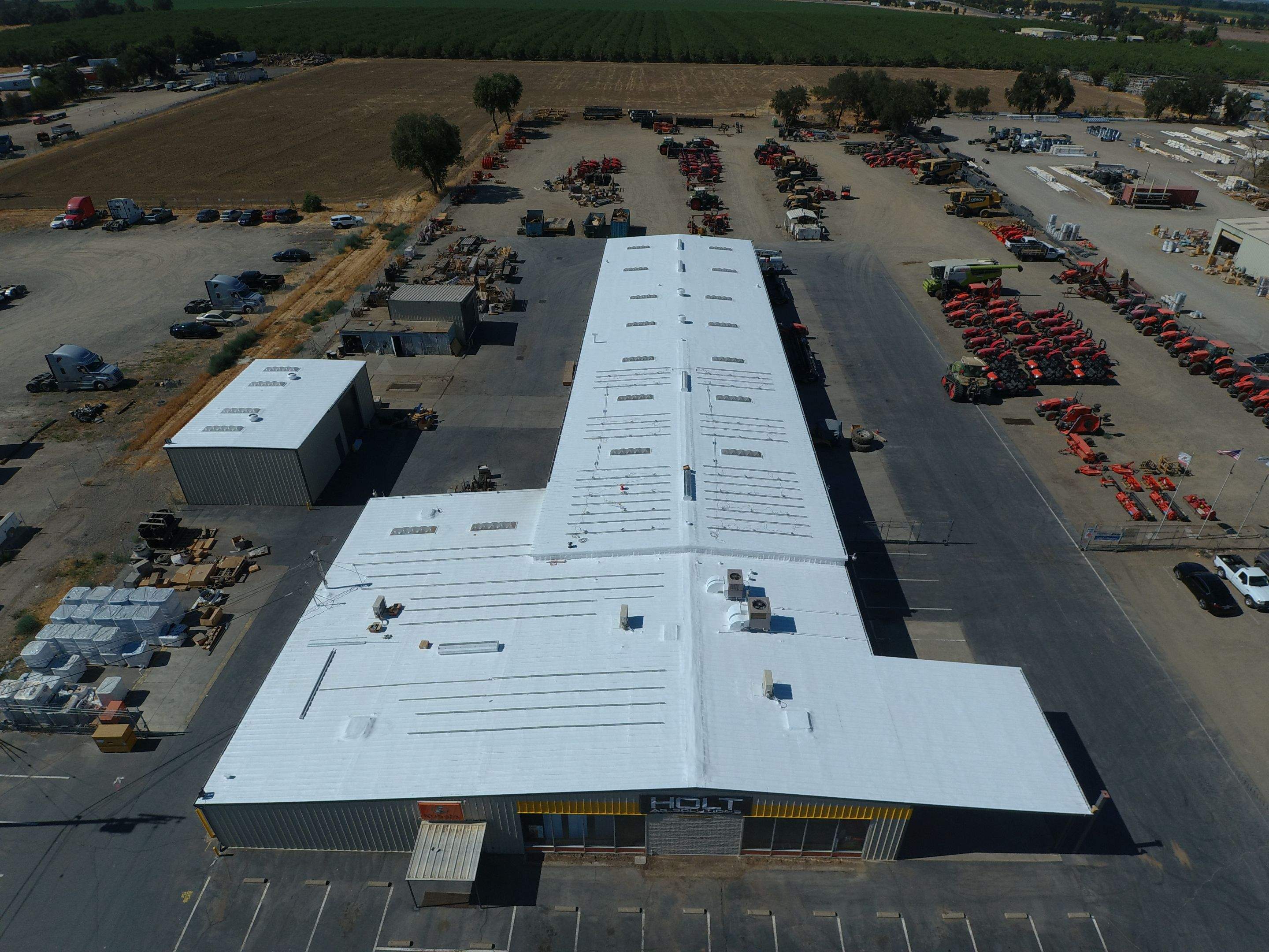 Spray foam and coatings using Conklin Benchmark/PUMA XL coatings and spray foam by Straight Edge Roofing Inc