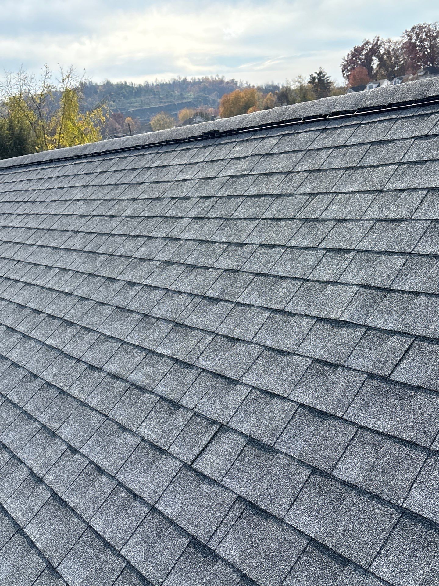 Residential Roofing Installation using GAF Timberline HDZ Oyster Grey by Rainstoppers Roofing