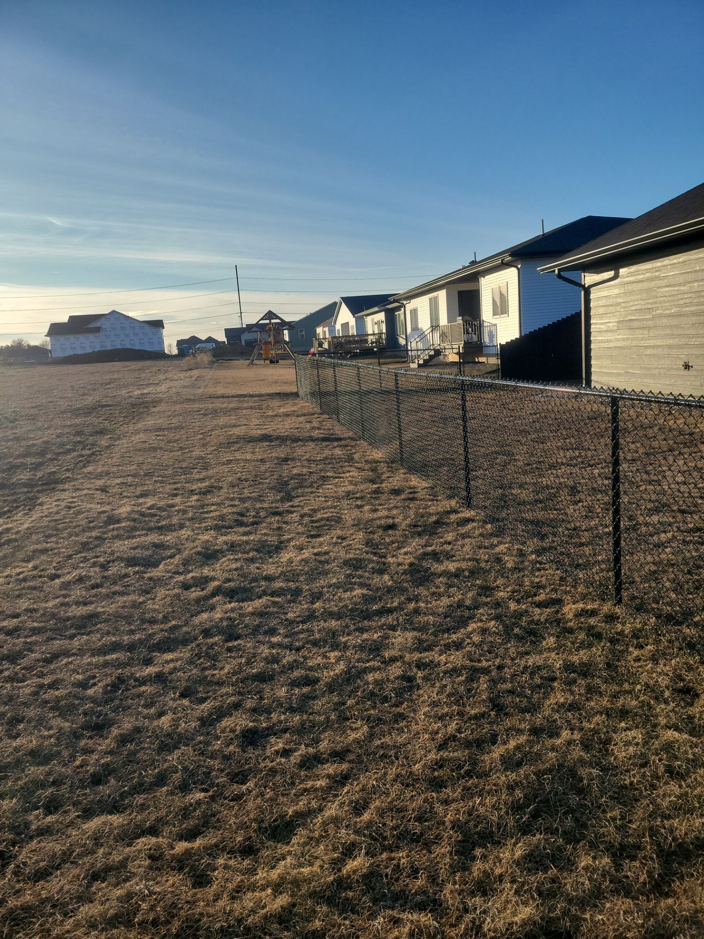 Residential Fencing Installation for New Construction Homes in Cedar Falls by Perfect Picket Fence and Stain
