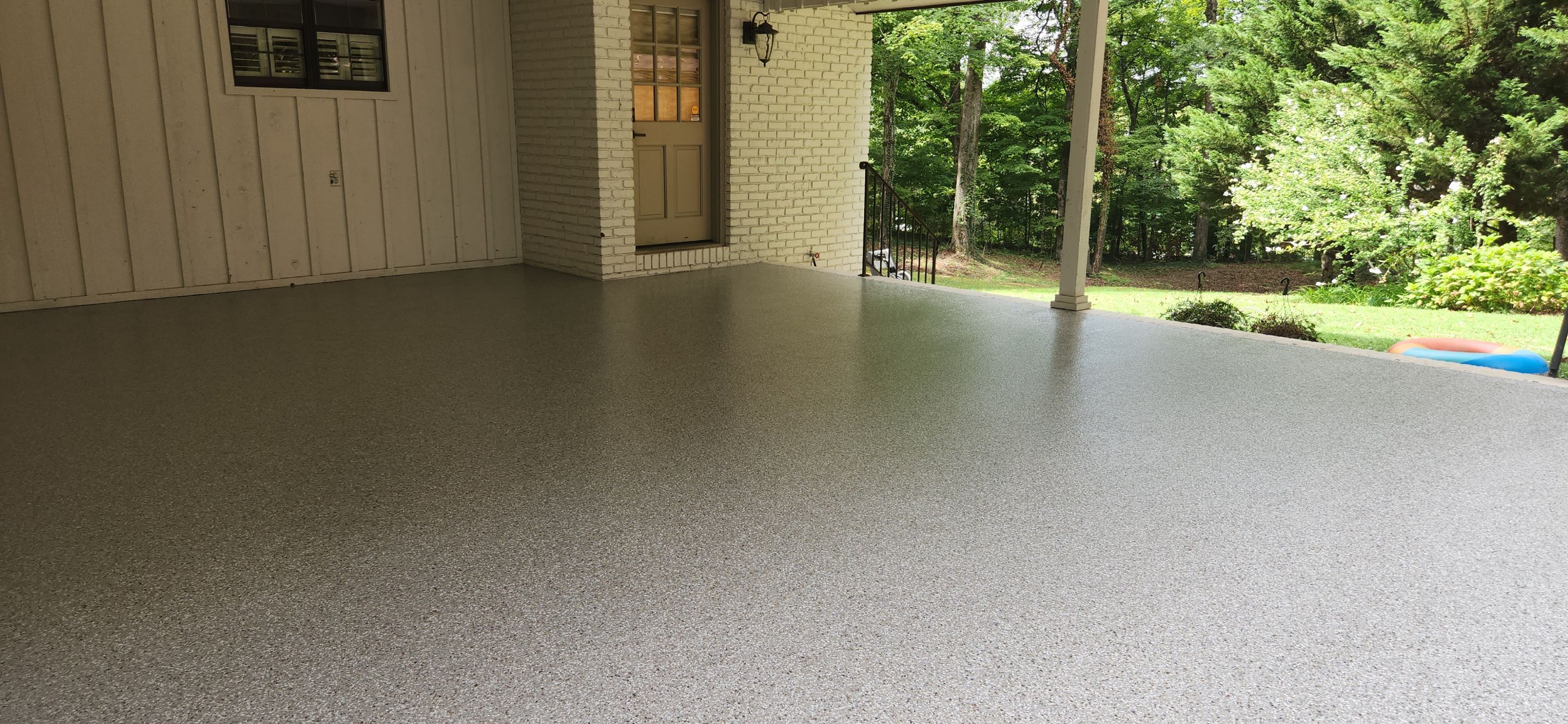 Carport Renovation using Creekbed by Elite Floor Solutions