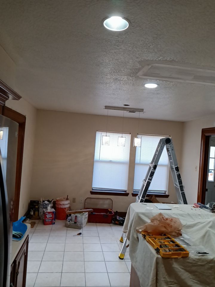 Interior and exterior painting project by Roof Concepts Construction