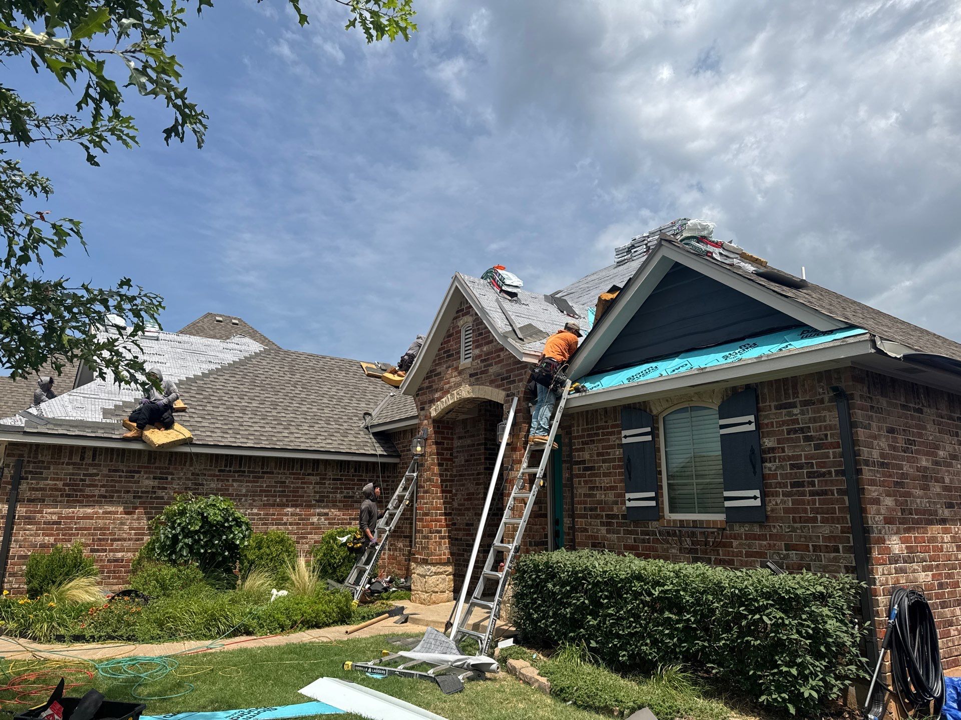 GAF Architectural Shingle Roof Replacement and Decking Repair in Mustang by 5Coat Roofing & Construction