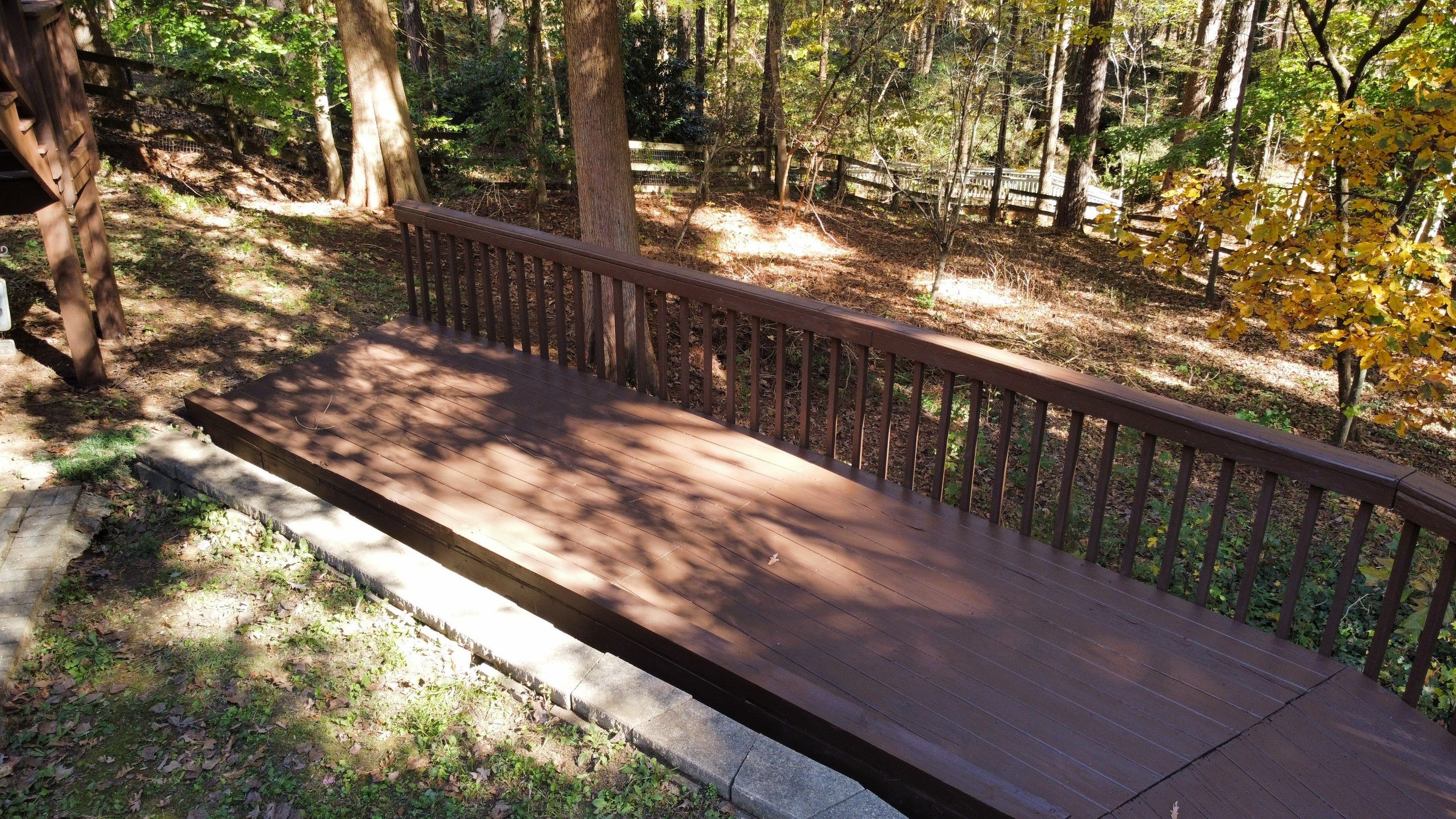 Multi-Level Wood Deck Staining and Refinishing in Duluth by Swift Home Renovations