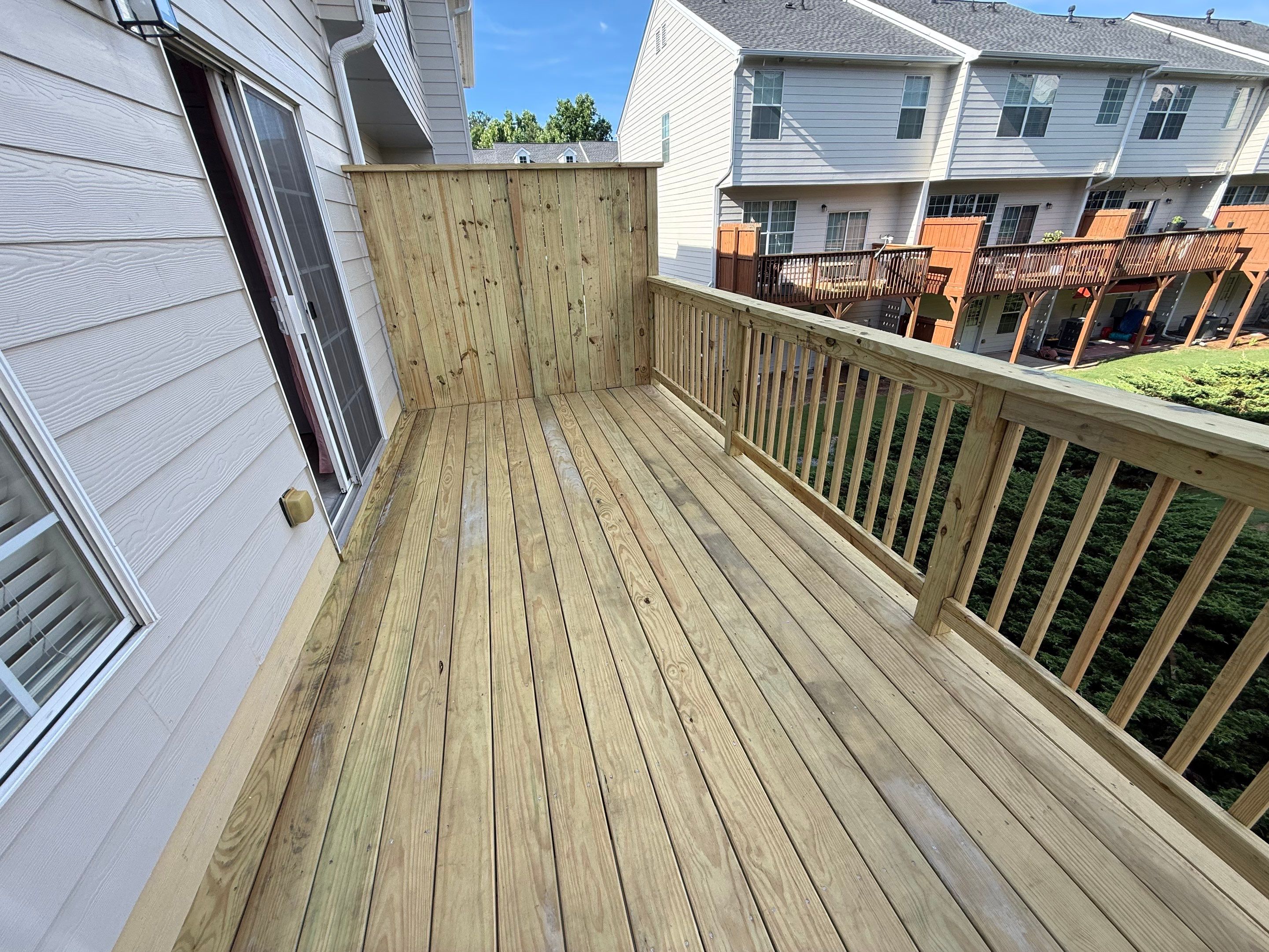Elevated Pressure-Treated Wood Deck Replacement in Atlanta by Swift Home Renovations