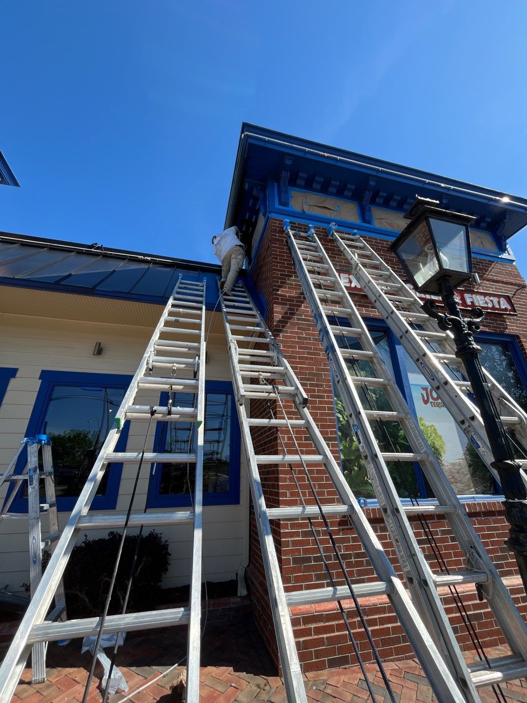 Roof painting, Jose Tequilas Norfolk, VA by AKK Painting LLC