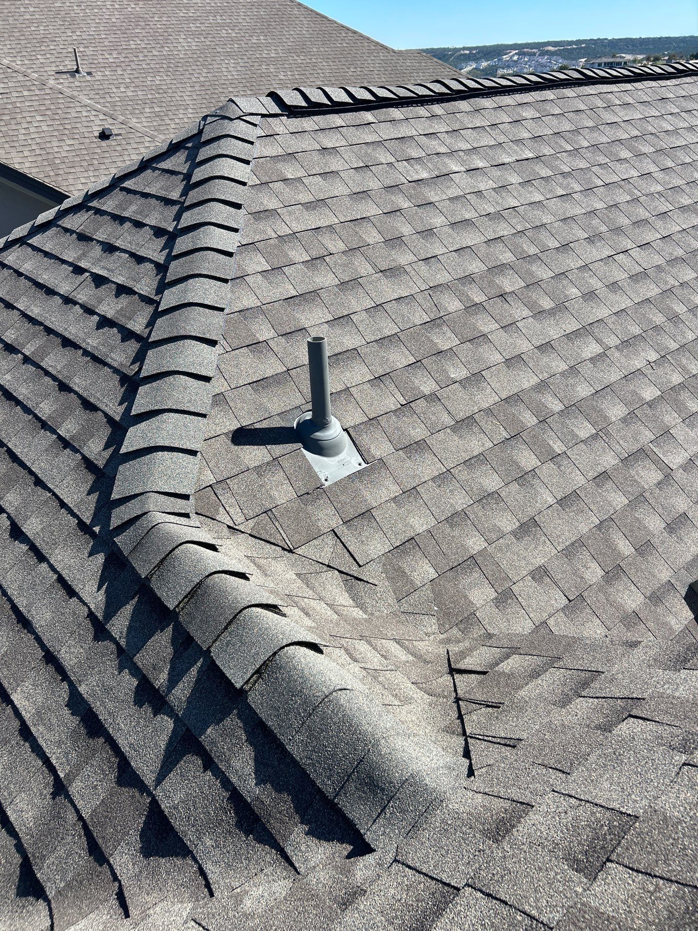 Residential Roof Replacement using GAF - Armorshield ll - Weathered Wood by Action Exteriors Austin