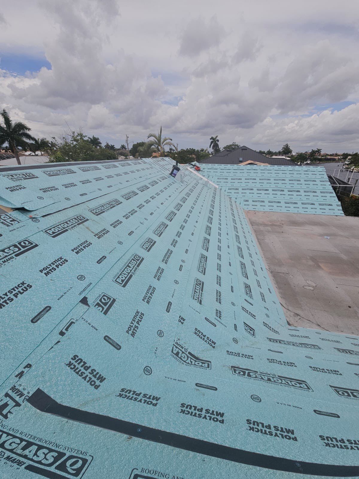 Residential Roofing Installation using Gulf Coast Metals Gulf Seam Panels by Four Peaks Roofing