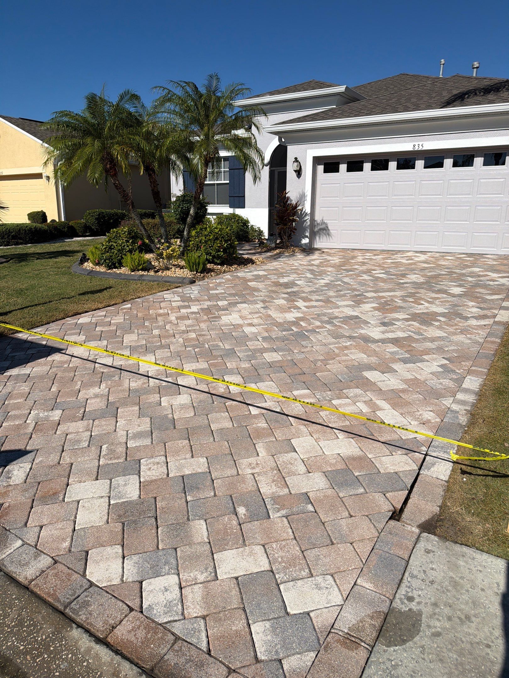 Herringbone Paver Driveway Repair, Stripping and Sealing in Sun City Center by Supreme Paver Experts