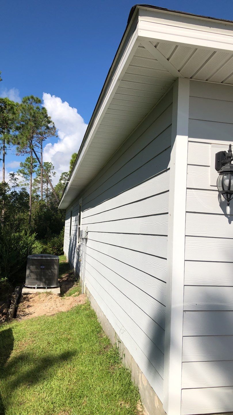 Seamless Gutter Installation using White by Gutter Professors