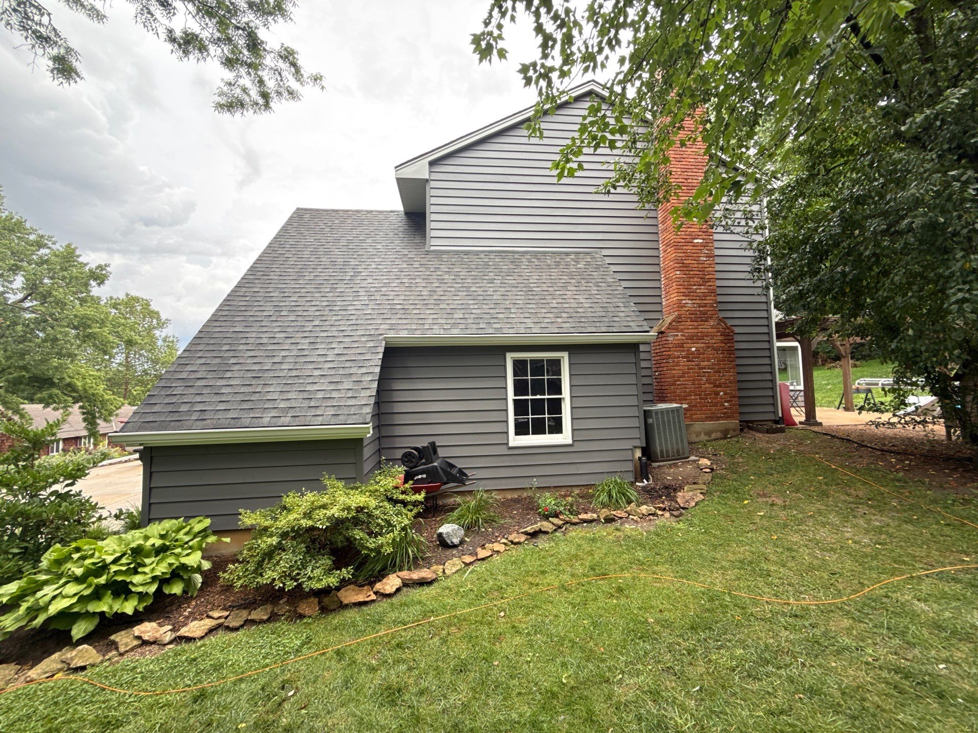 Full Exterior Siding Upgrade and Board and Batten Installation in Shawnee by EEC Windows, Siding & Roofing