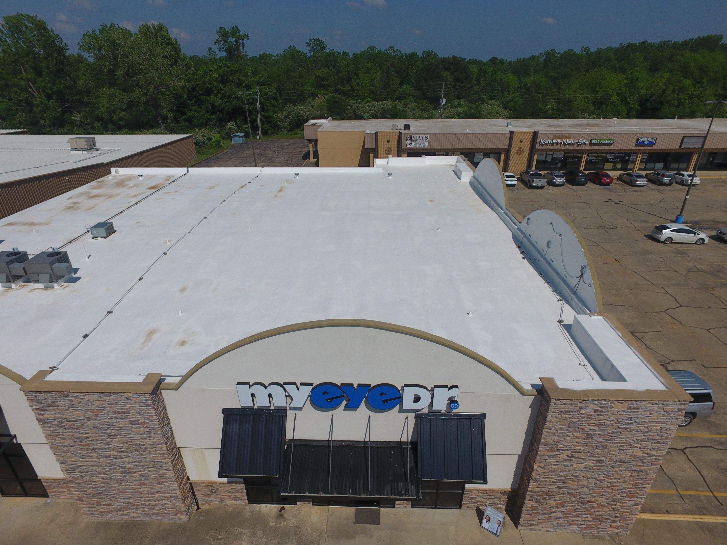 Commercial Roofing Installation using Aldocoat Coatings by Hostetler Roofing
