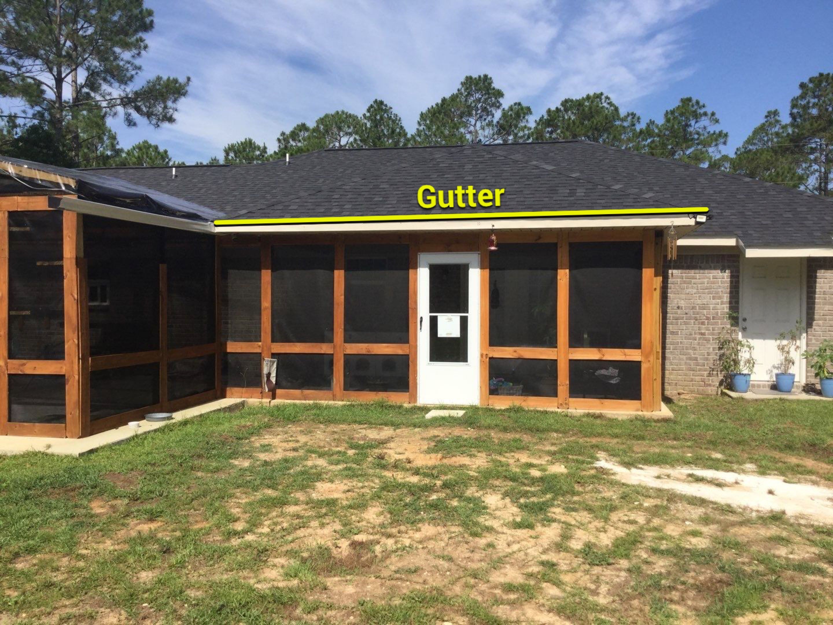 Downspout Installation using White Down Spouts in Milton FL by Gutter Professors