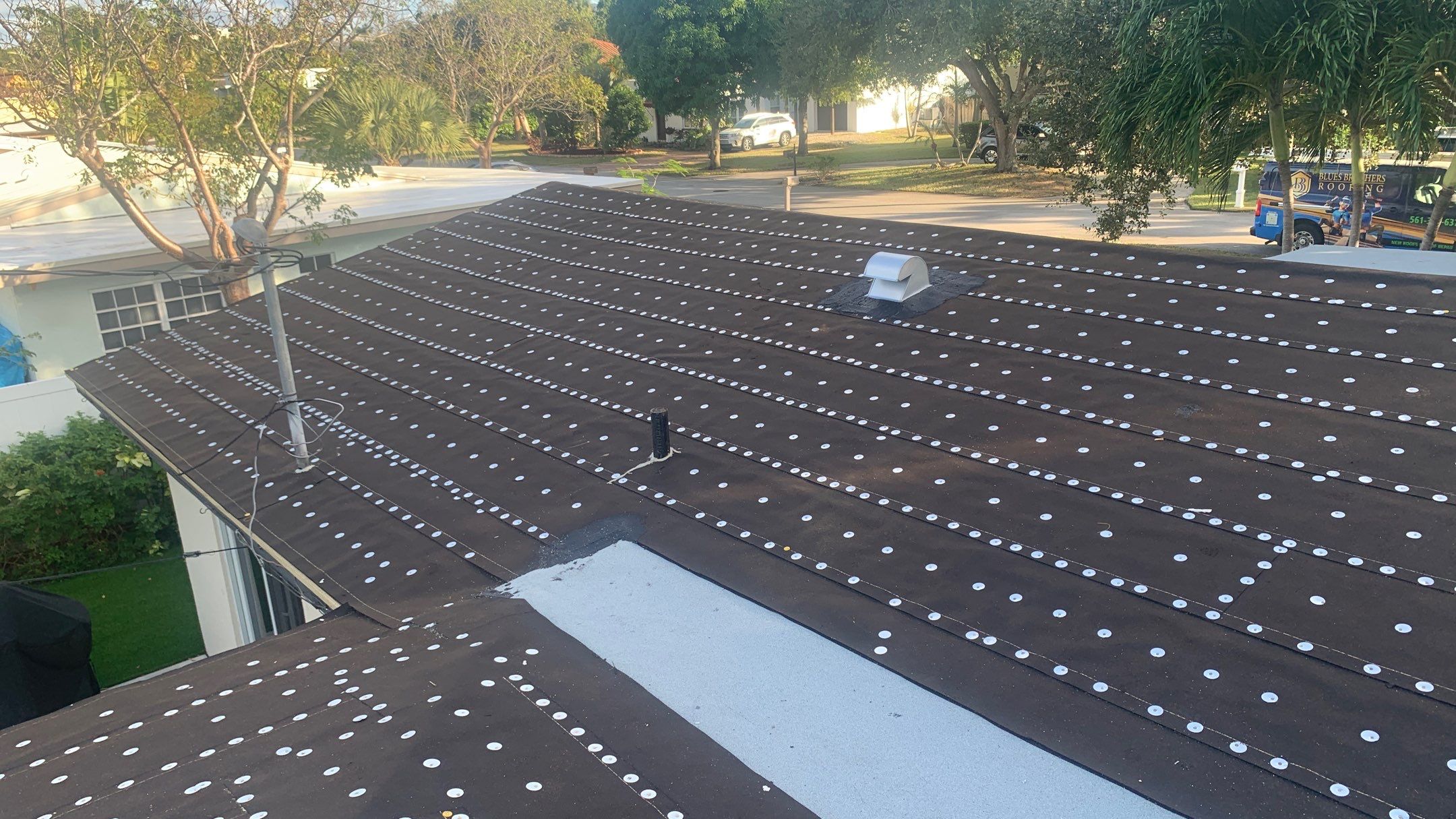 Residential Roofing Installation using 1" Nail strip metal roof by BLUES BROTHERS ROOFING