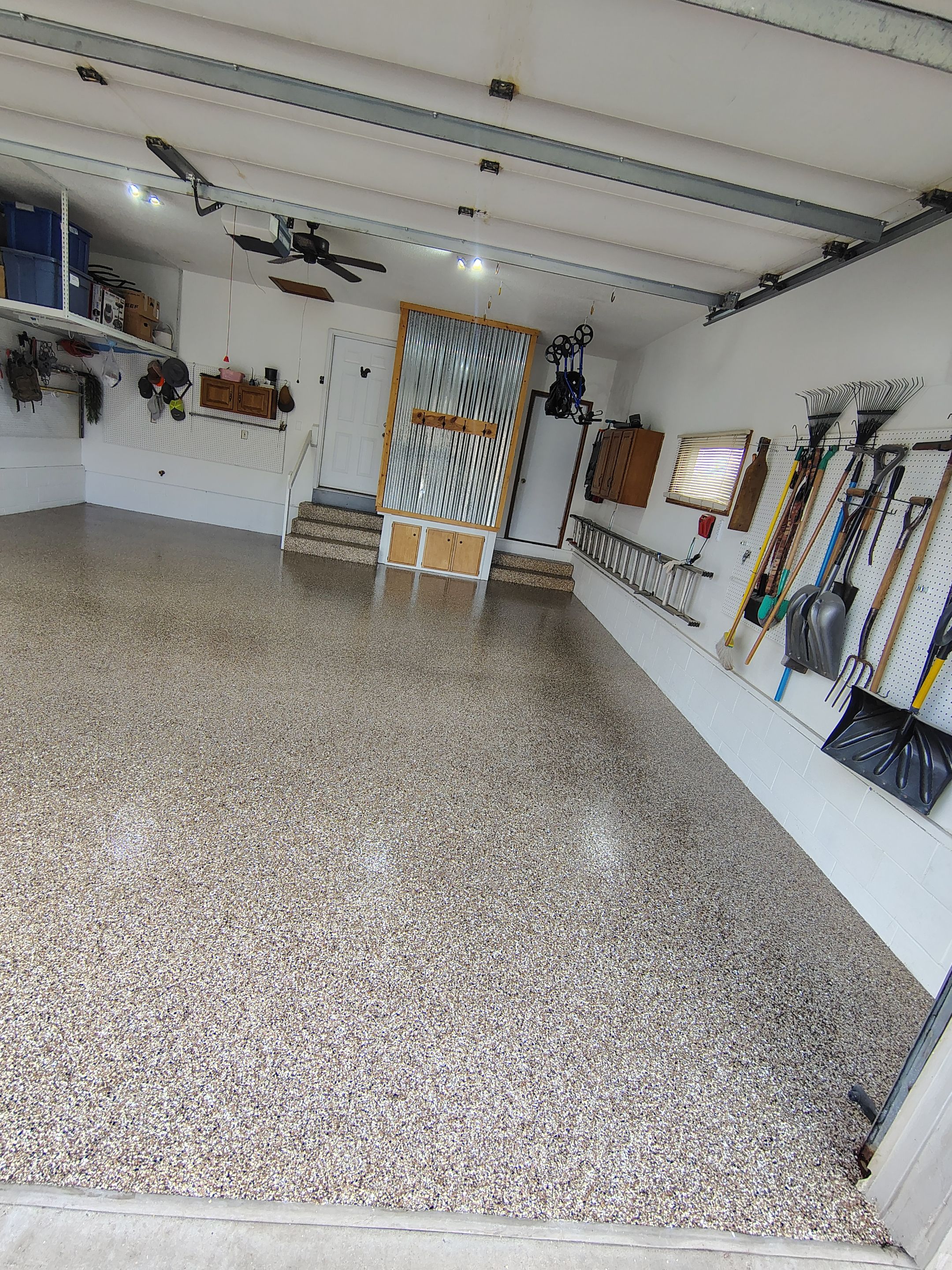 Multi-Colored Flake Epoxy Garage Floor Coating and Crack Repair by Select Painting, Coatings & Garage Cabinets