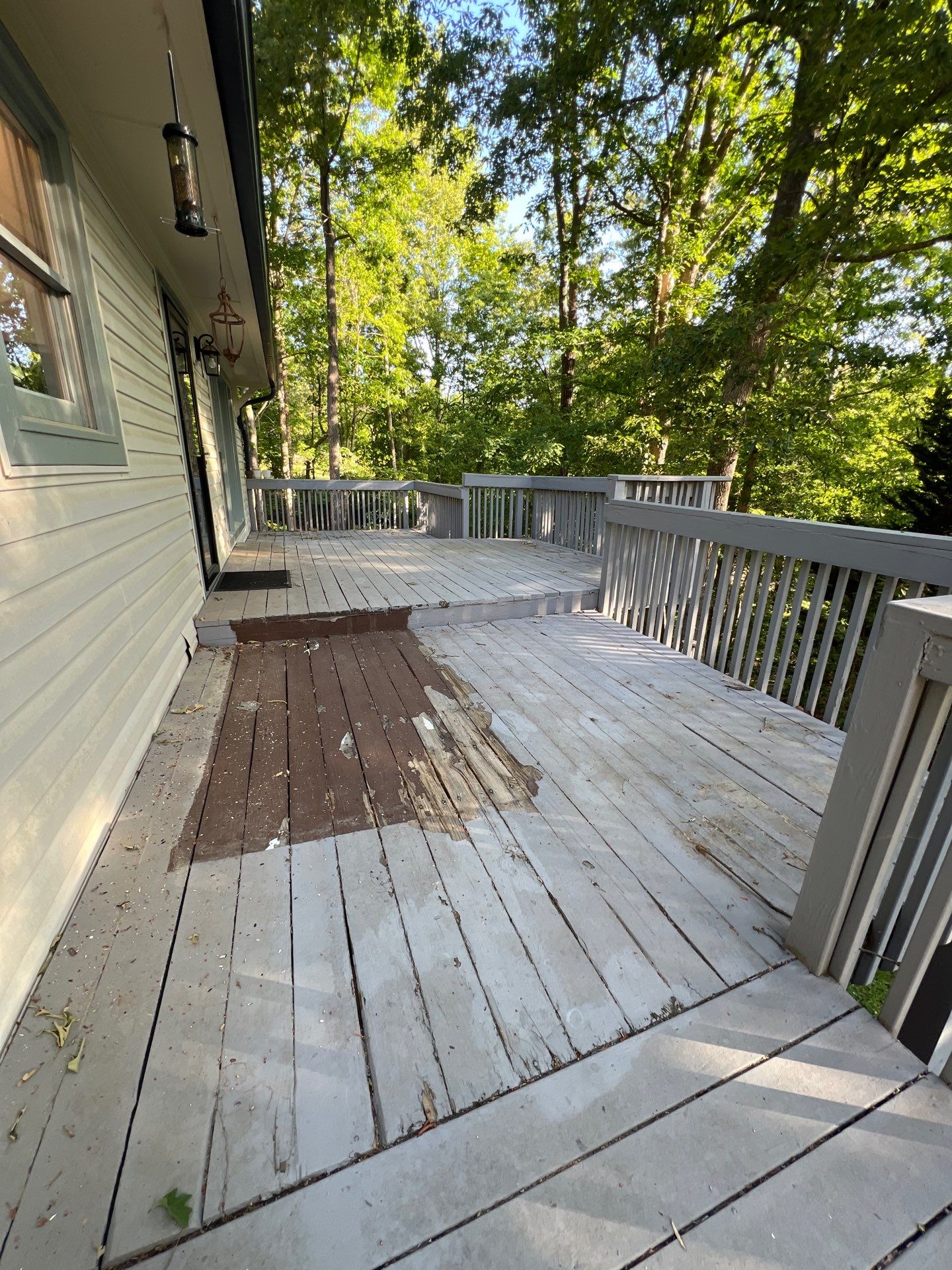 Pressure-Treated Wood Deck Resurfacing and Staircase Reconstruction in Canton by Swift Home Renovations