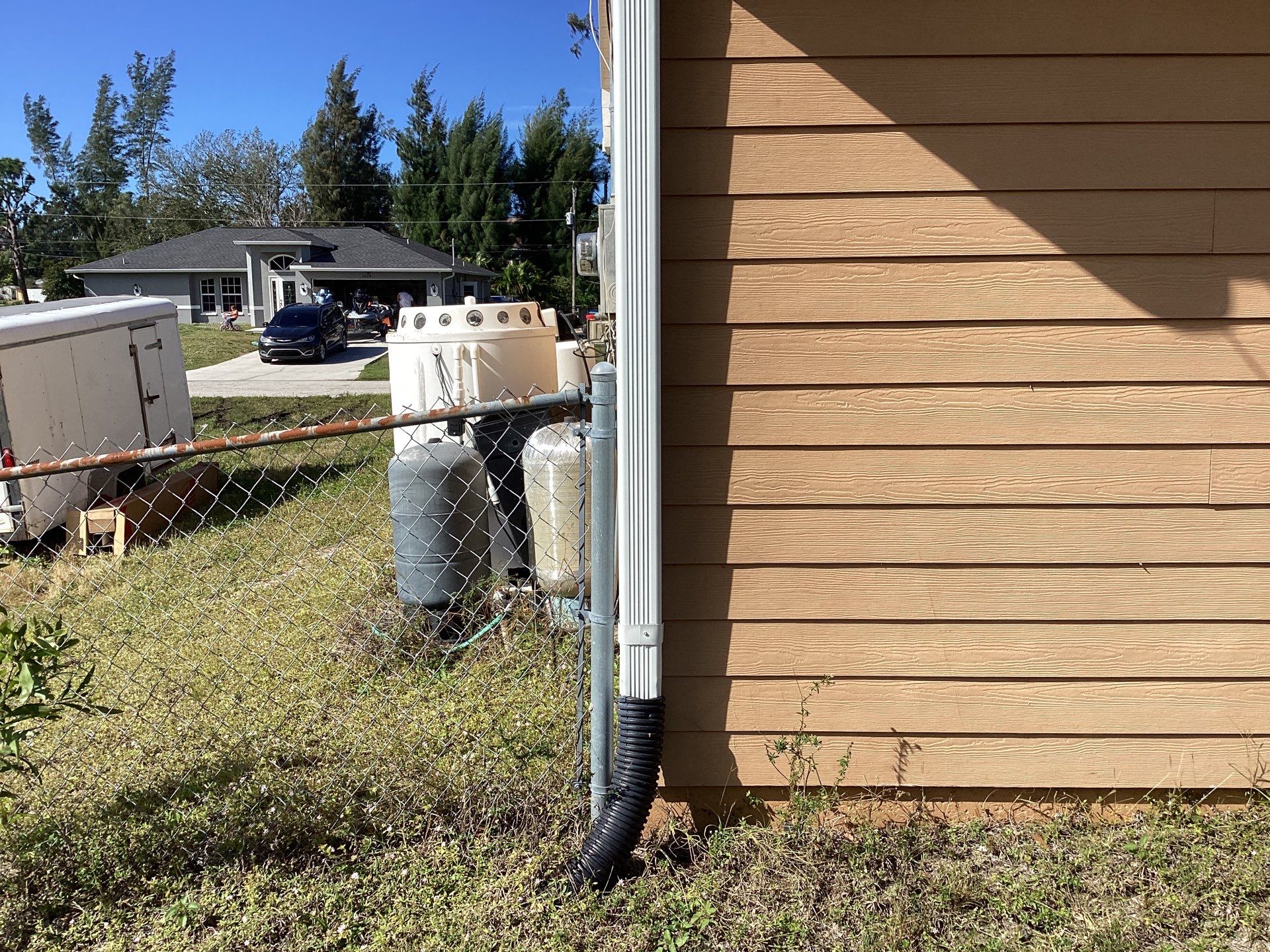 Soffit & Fascia White + New Downspouts by Gutter Professors