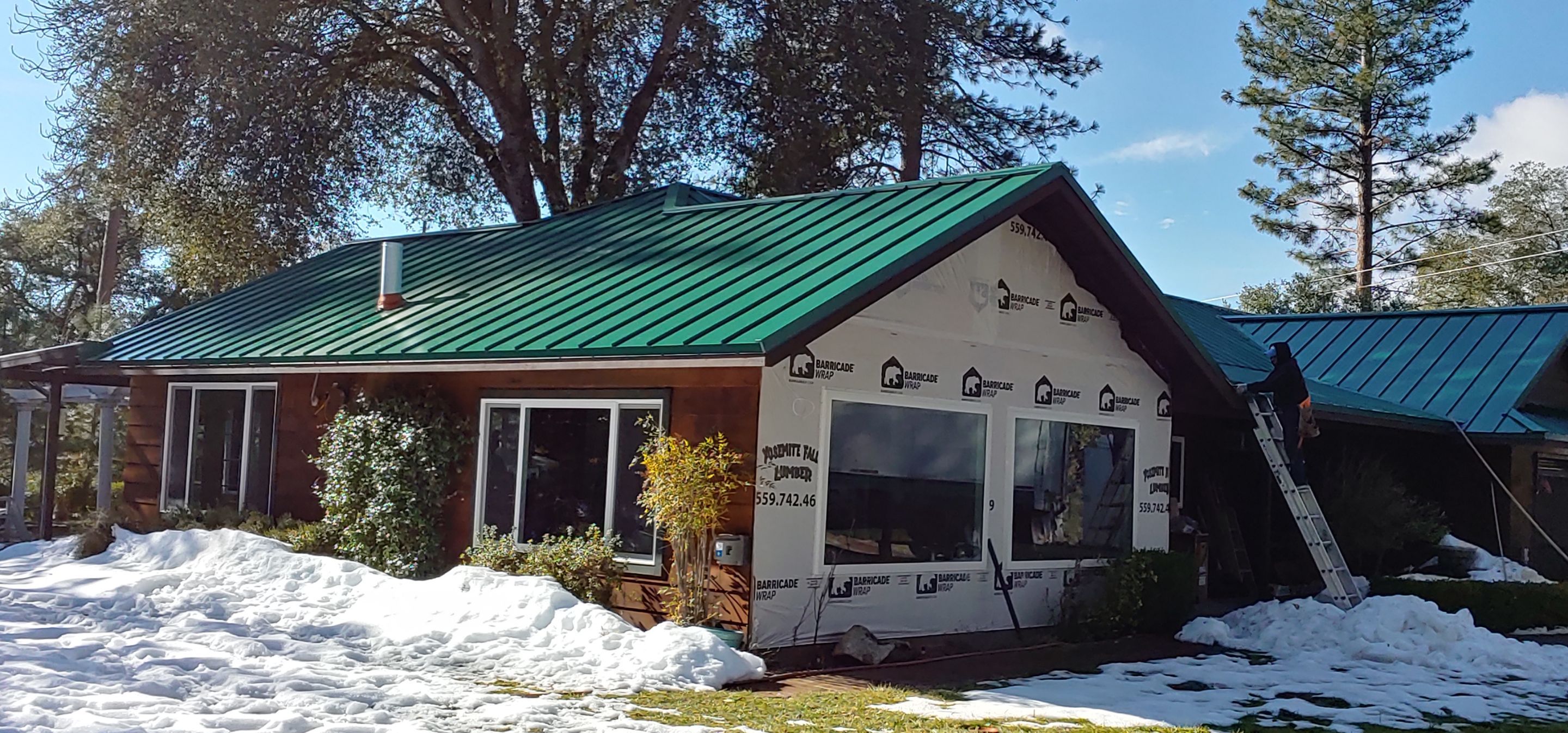 Metal roofing installation using Standing seam metal roofing system by Straight Edge Roofing Inc