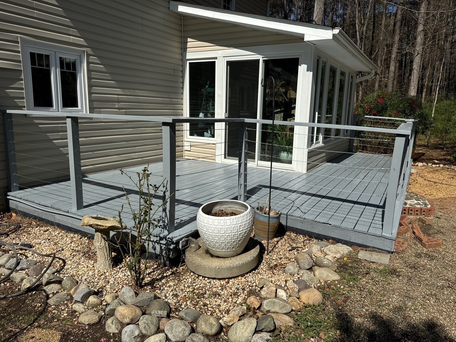 Deck staining by GonzalezPainters & Contractors Inc 