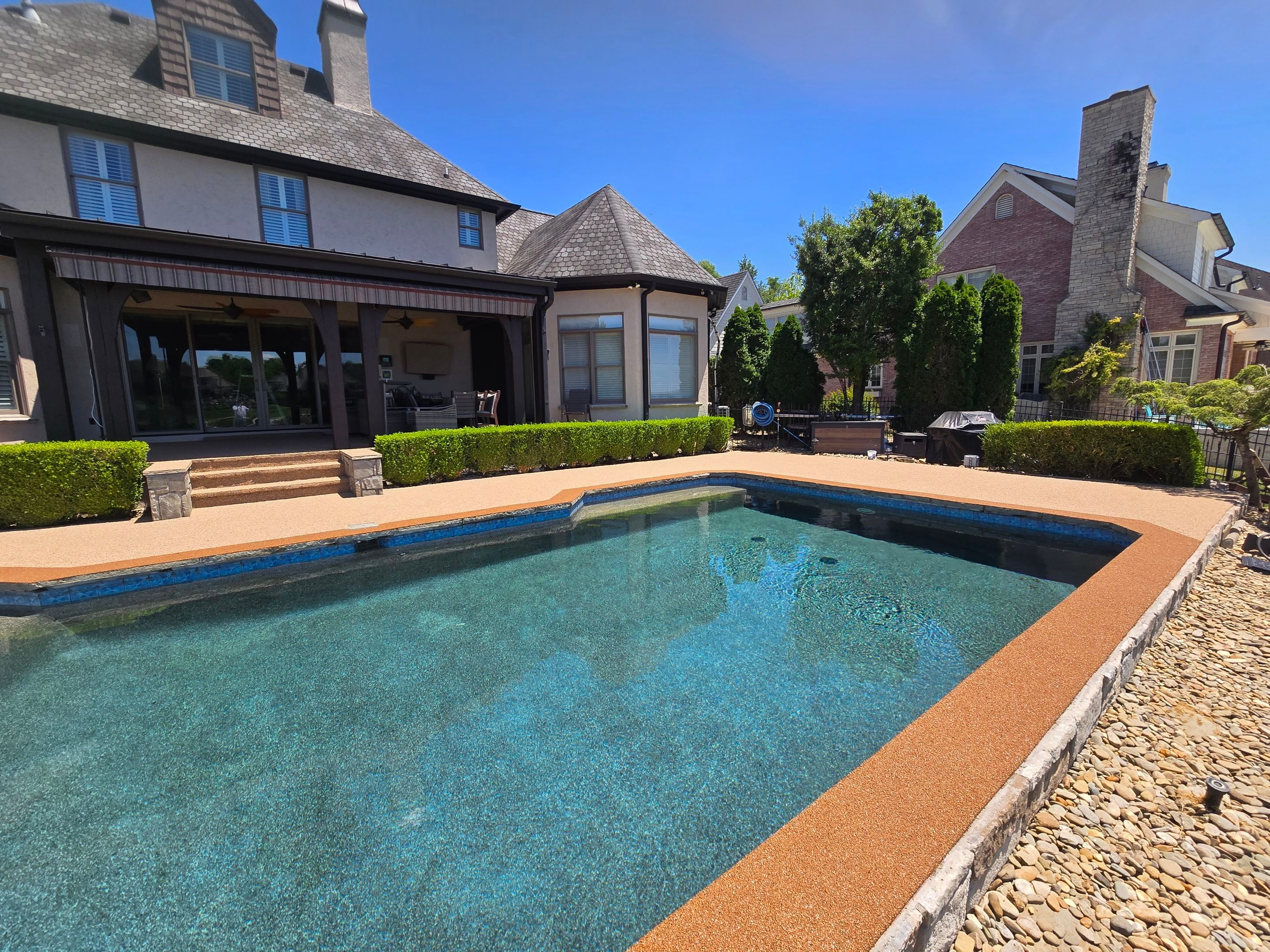 Lakeside Pool Resurface — Sandstone Rubaroc® with Medium Brown Border by Elite Floor Solutions