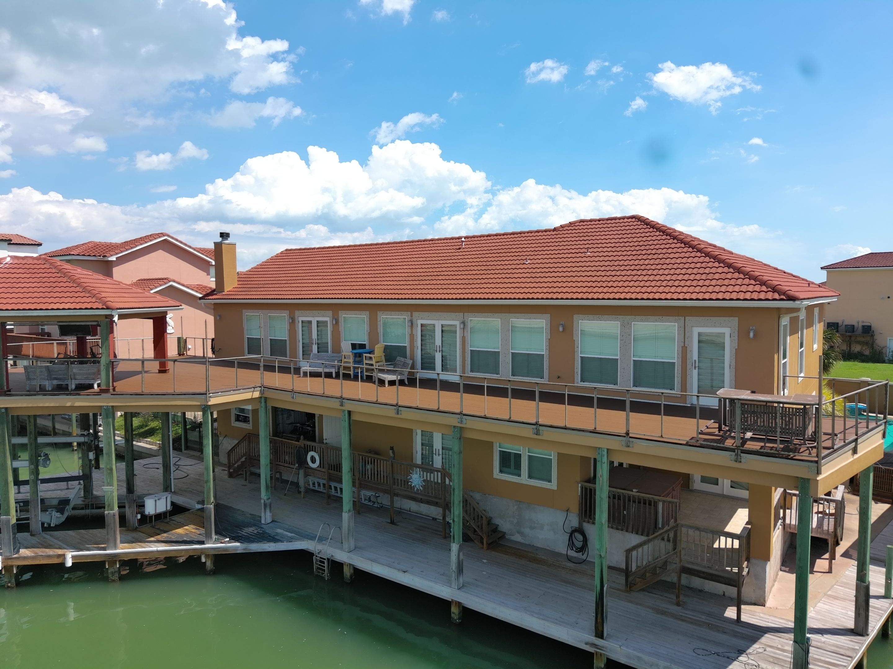 Waterfront Walkout Waterproofed! by Bayfront Roofing and Construction