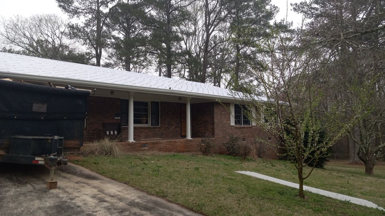 Bold Switch: From Shingles to Metal by Georgia Roof Advisors