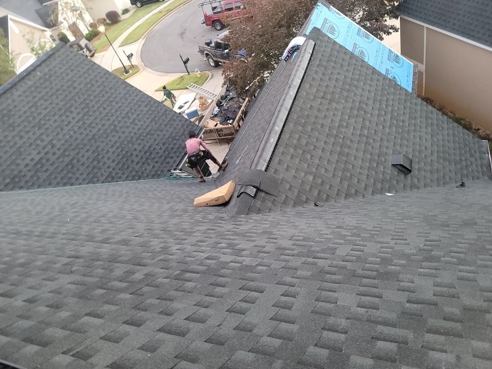 Residential Roofing Installation using Roof Replacement by American Roofing & Construction LLC