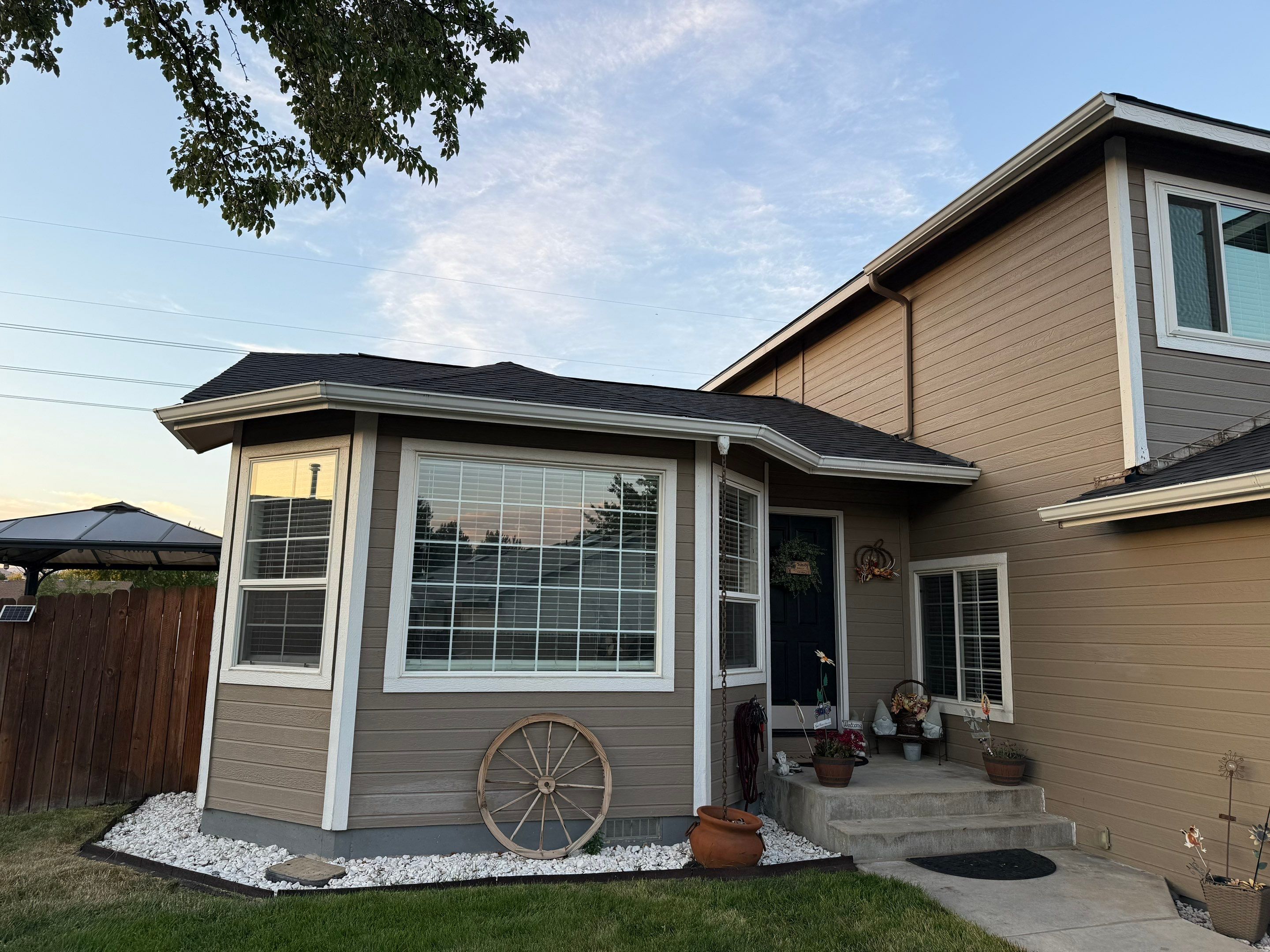 Residential Roof Replacement and Seamless Gutter Installation in Boise by Olive Roofing
