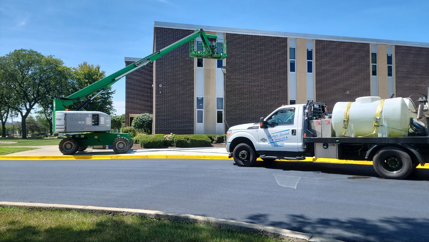 commercial pressure washing using Algaecide, soft wash soap by Northern Power Washing LLC.