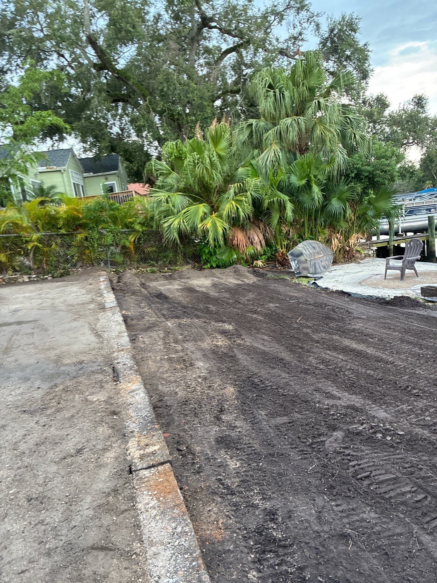 Grading back yard oasis by Level One Grading