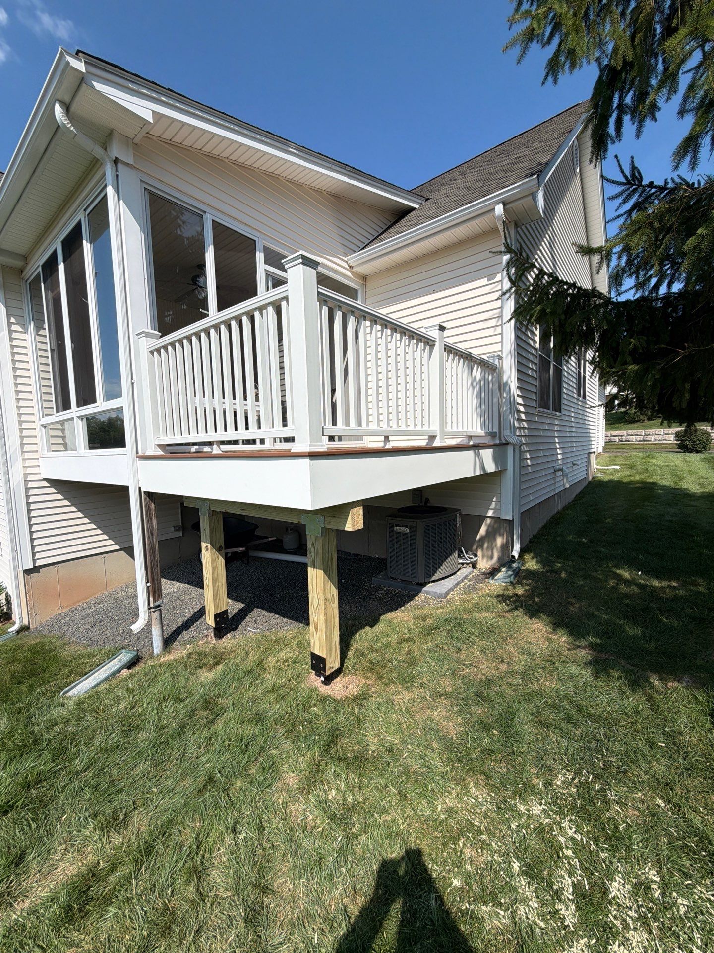 New Trex Deck, Tiki torch boards with Transcend white railings. by DiGiorgi Roofing and Siding Inc