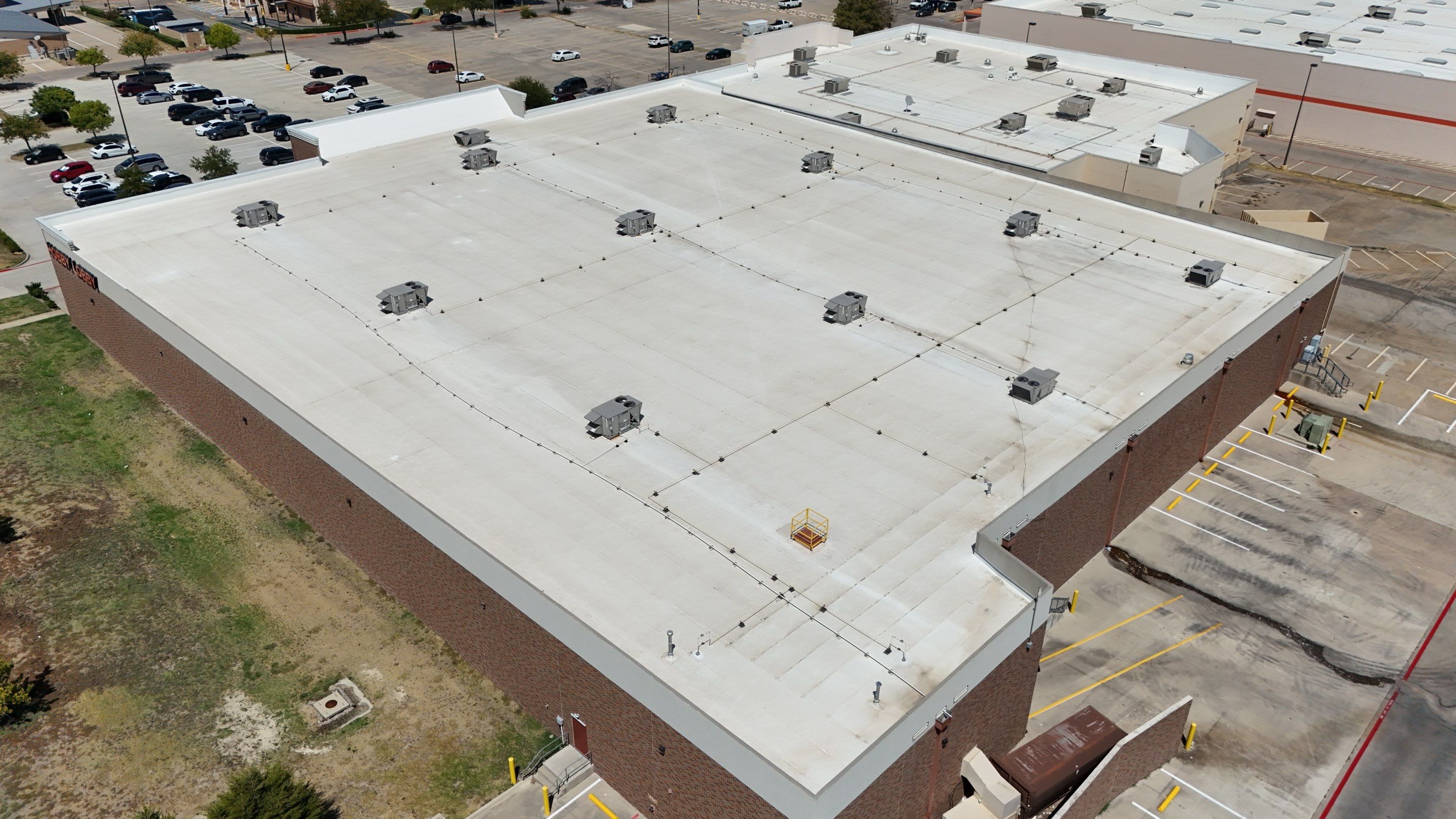 Commercial Flat Roof Repair and Safety Guardrail Installation in Plano by Armor Roofing | Exteriors