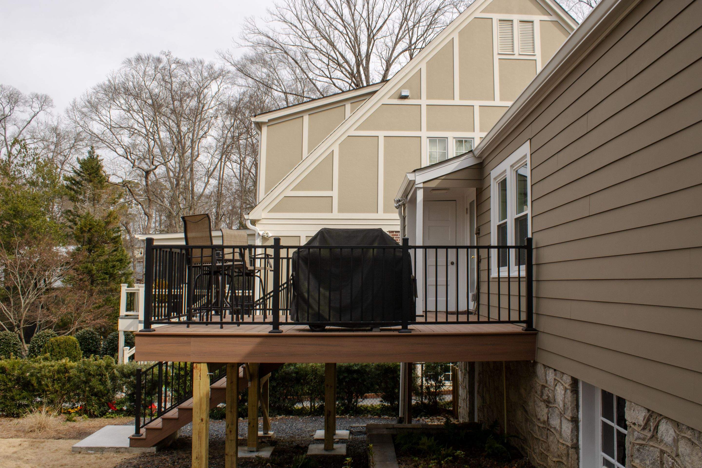 Full Siding Replacement, Deck Build, Exterior Paint, and Gutter Replacement  by Nelson Exteriors 