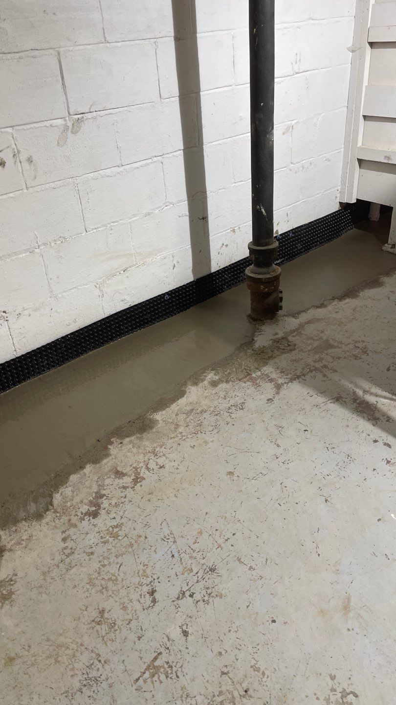 Basement Drain Tile & Sump Pump in Northeast Minneapolis by Waterproofing Northeast
