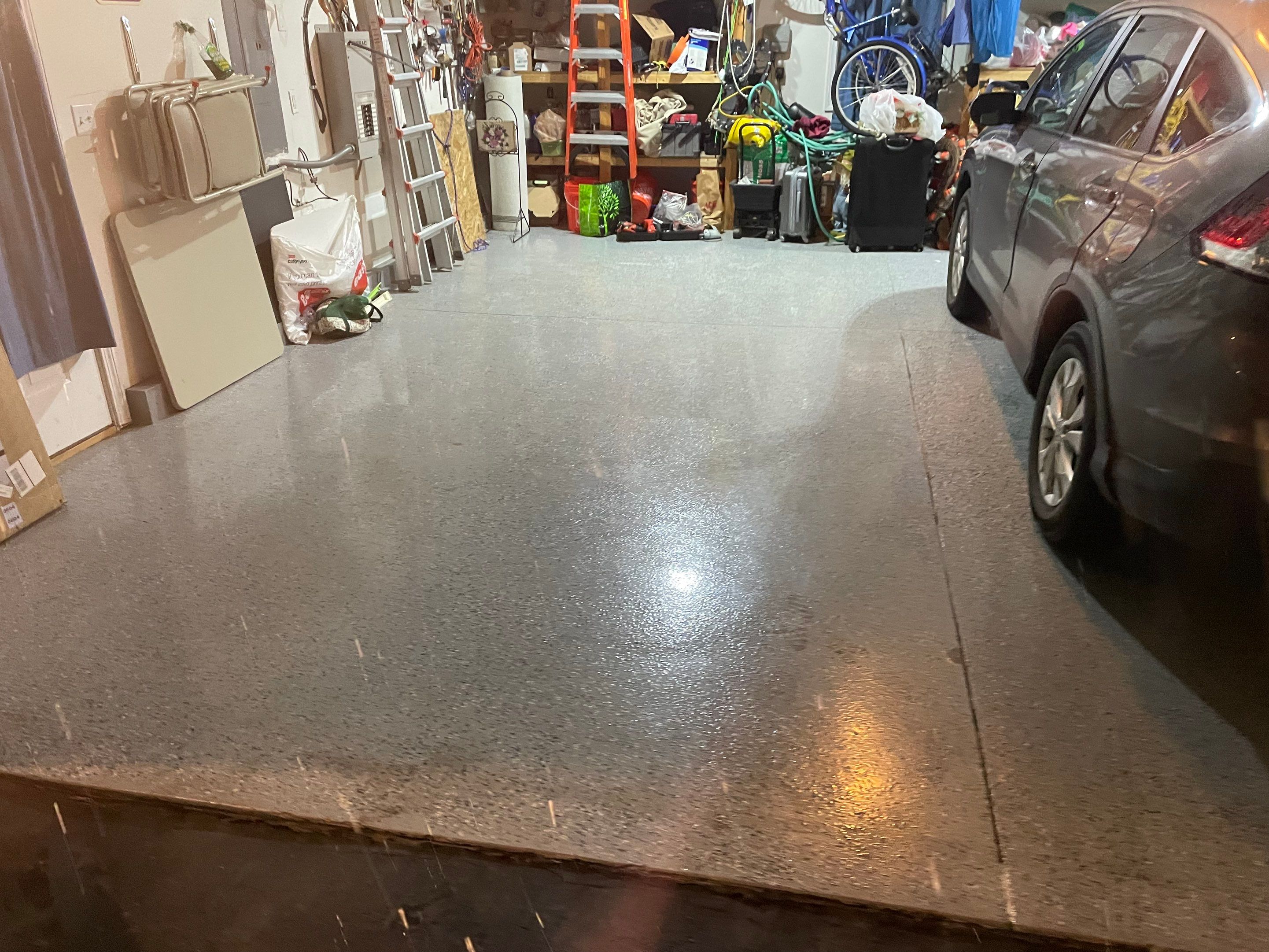 Garage in Londonderry, NH 03053 by Symphony Concrete Coatings